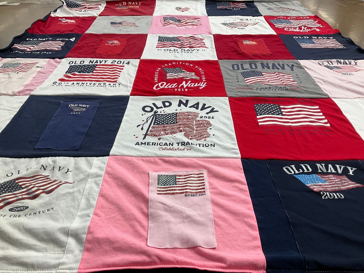 T-shirt quilt with clothing, shopping themes by Christina from NY