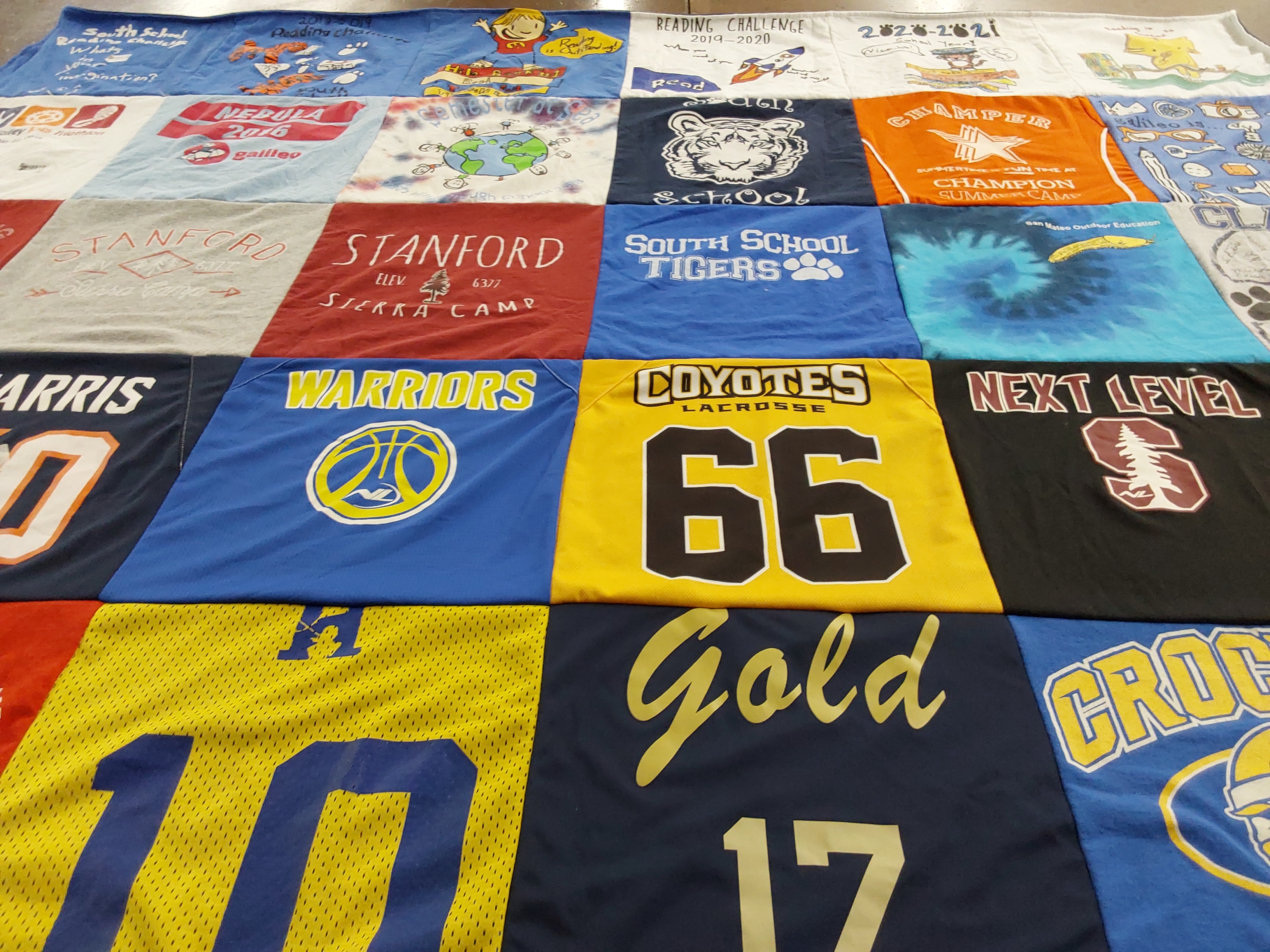 T-shirt quilt featuring warriors, coyotes lacrosse by Jamie from CA