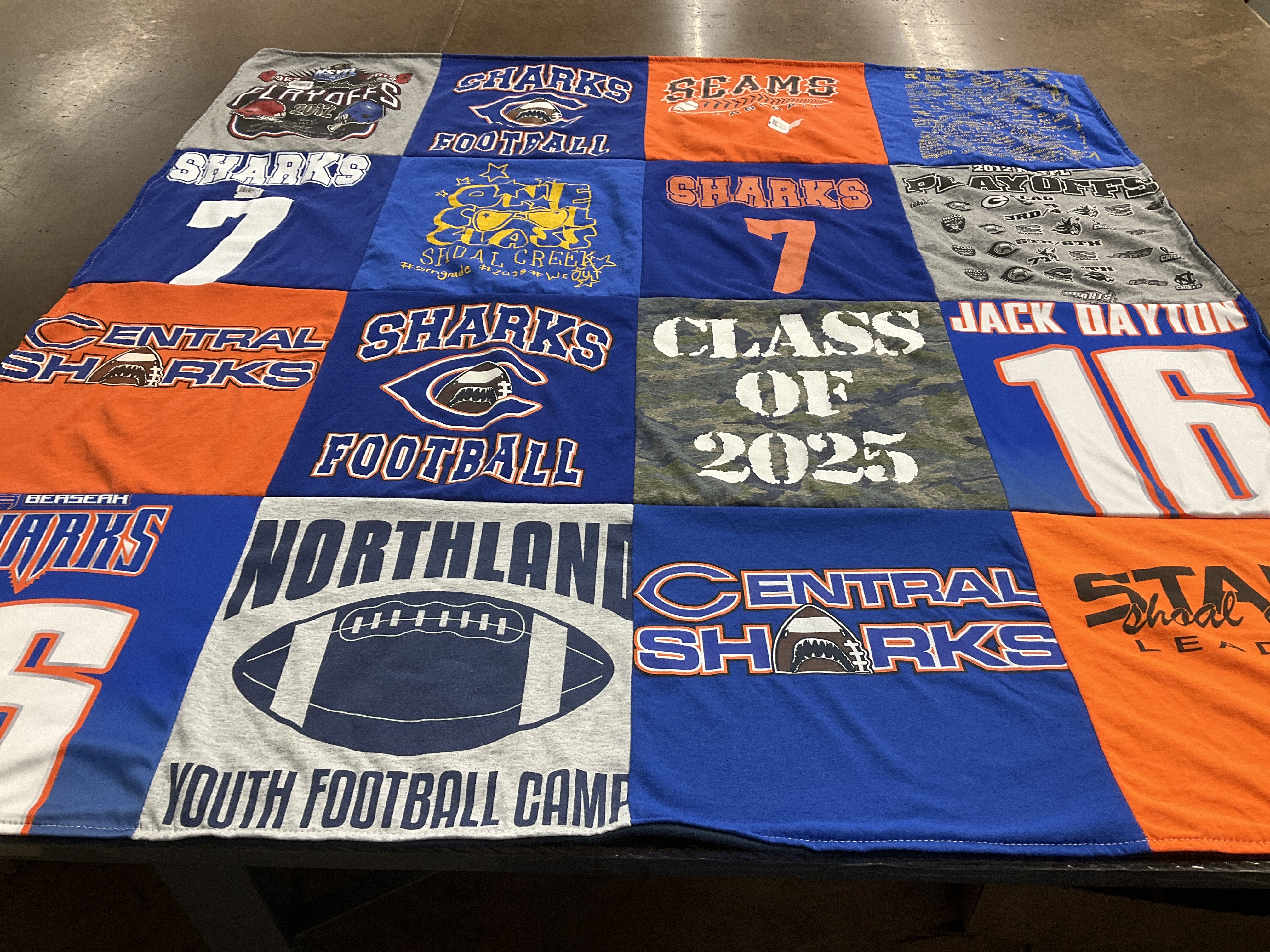 T-shirt quilt featuring central sharks, northland sharks by Sara from MO