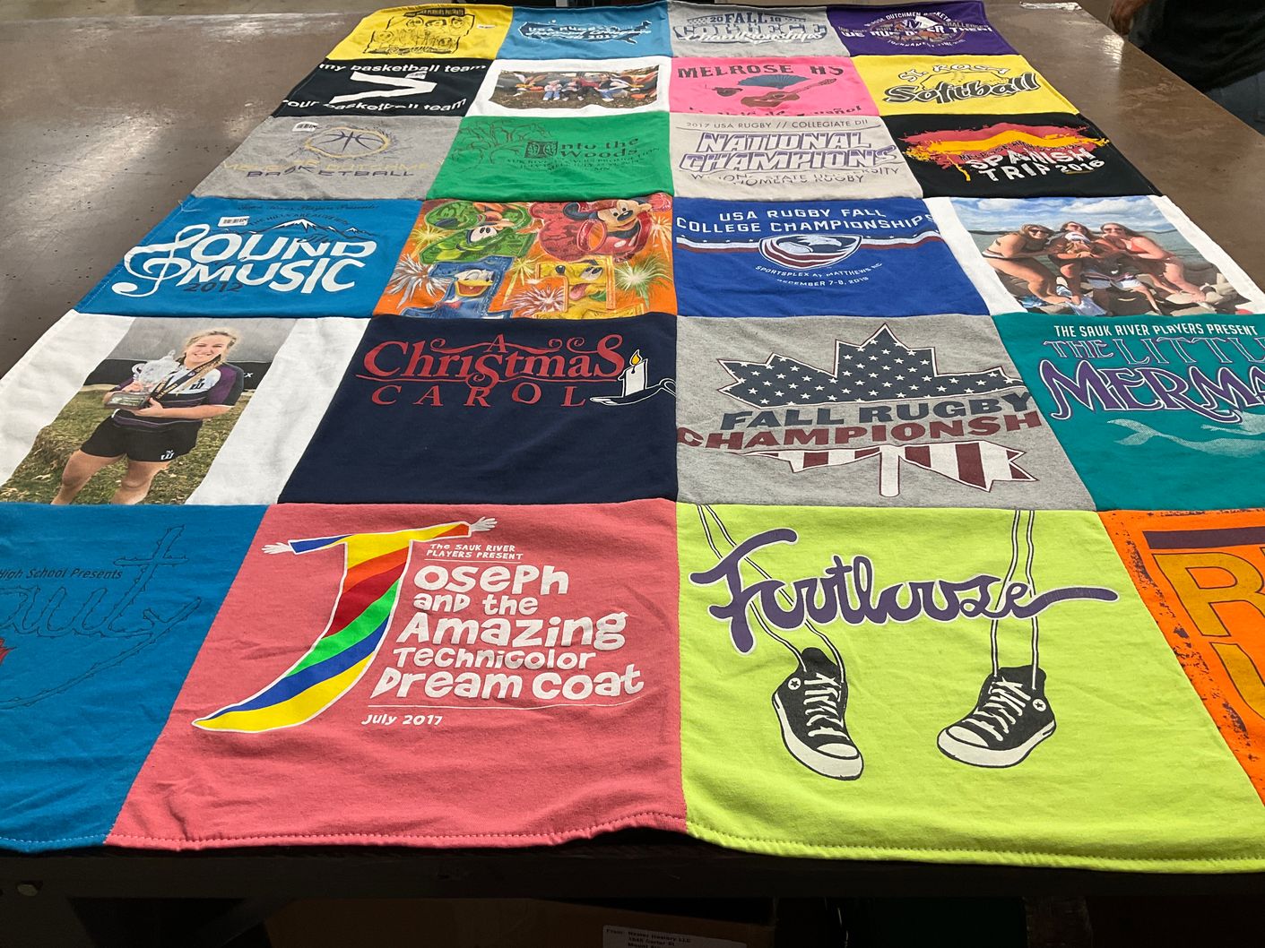 T-shirt quilt featuring sauk river rugby team by Jodi from MN