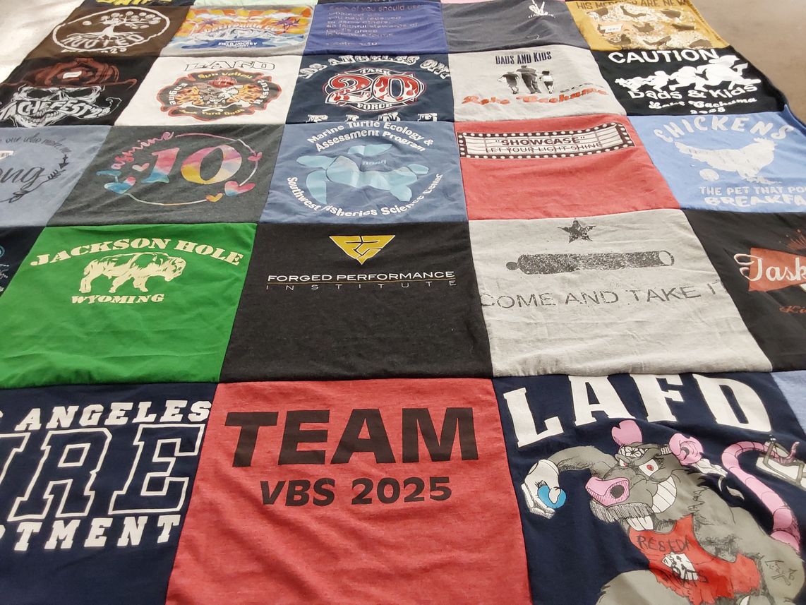 T-shirt quilt with firefighting, youth activities themes by Jeb & Lauren from CA
