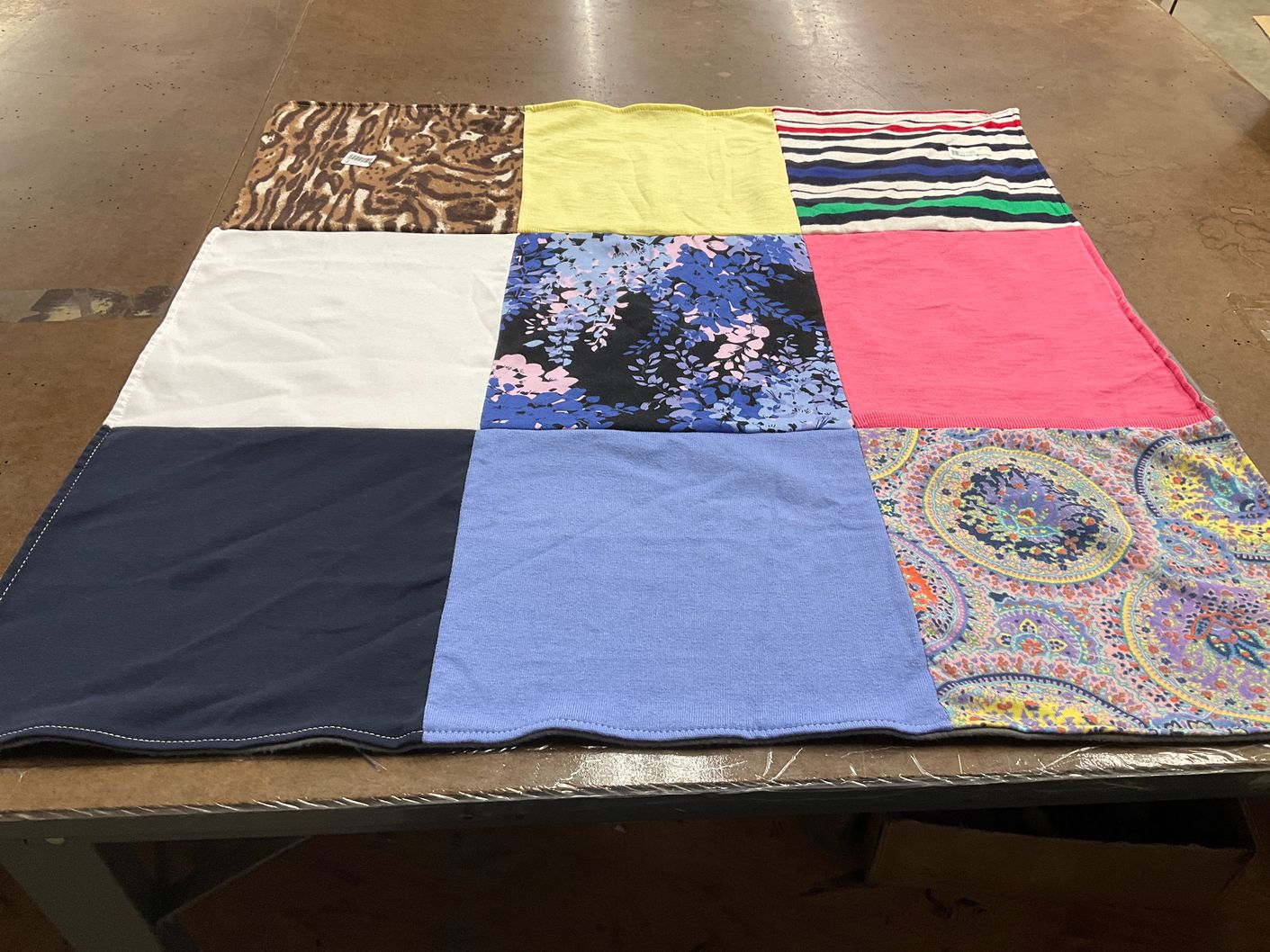 T-shirt quilt with textiles, crafting themes by Kristin from VA