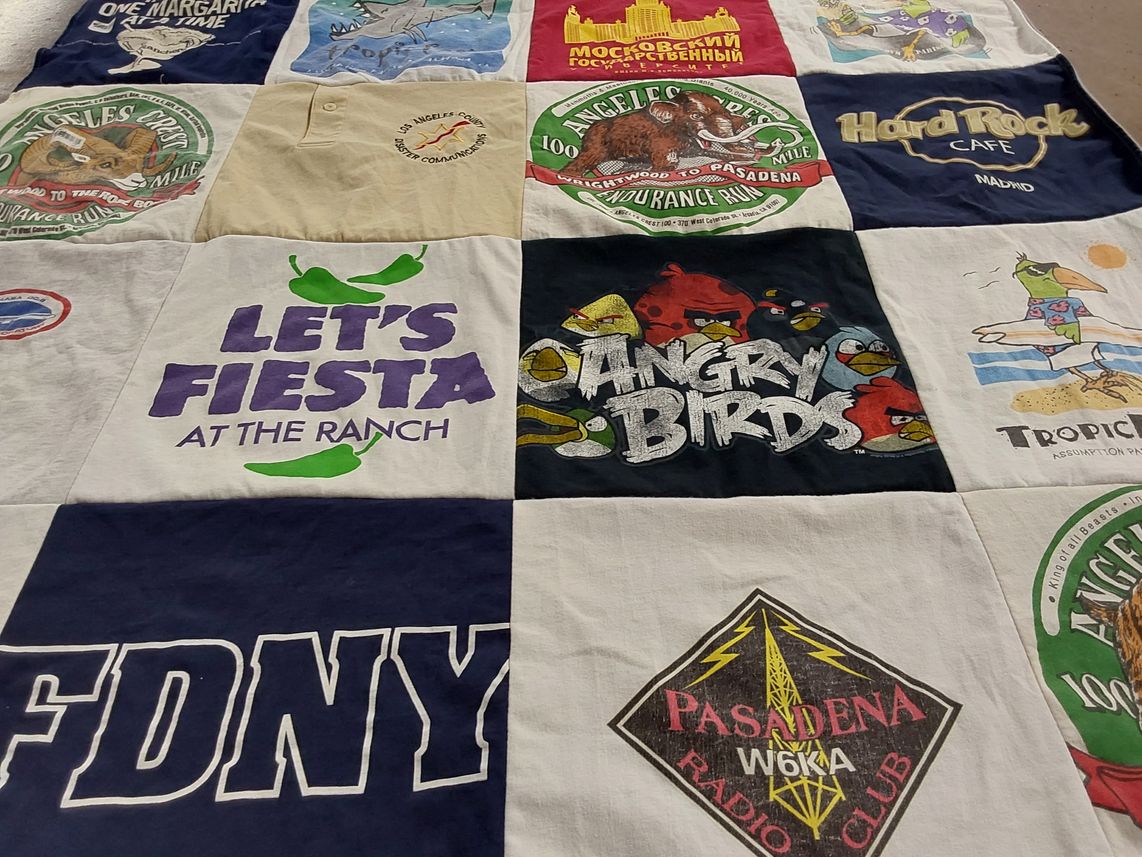 T-shirt quilt with fiesta, birds themes by Laura from CA