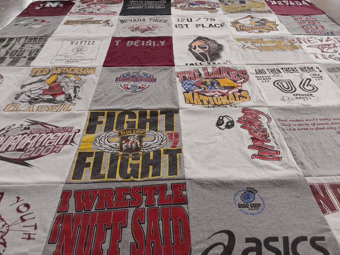 T-shirt quilt with wrestling, sports themes by Dawn from MO