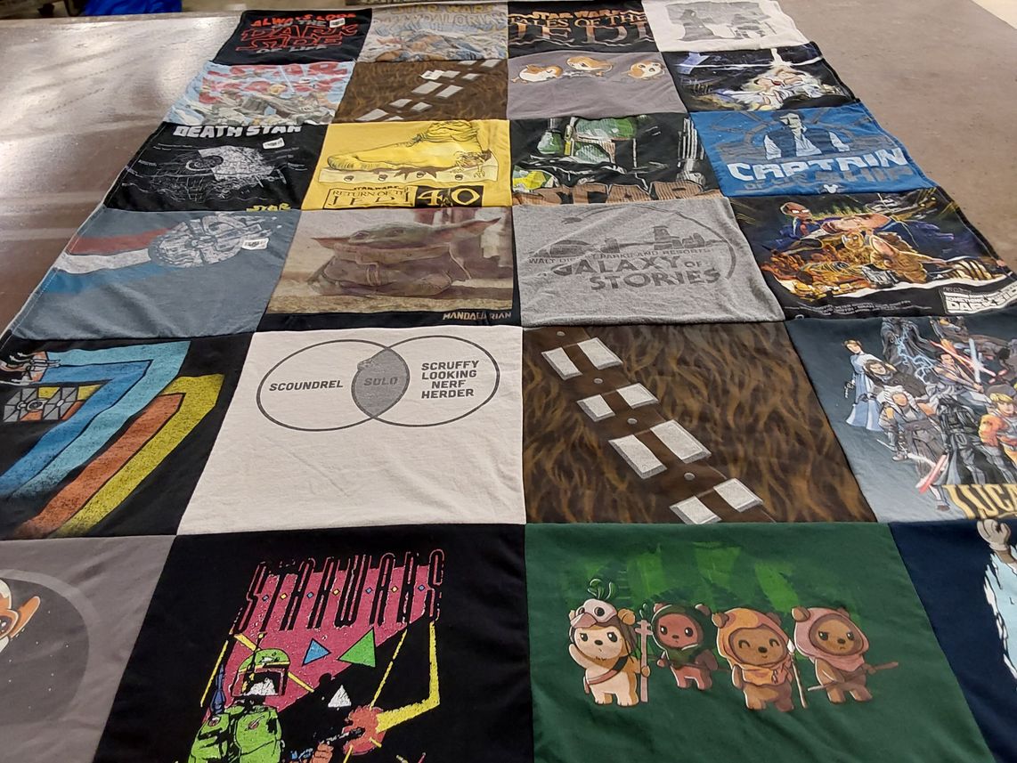 T-shirt quilt with star wars, science fiction themes by Elizabeth from CA