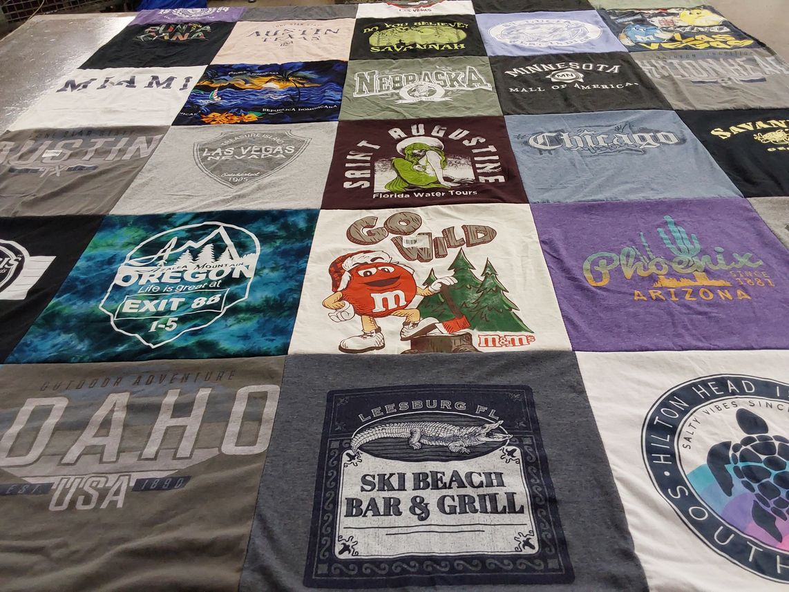 T-shirt quilt with travel, outdoors themes by Tressa from CA
