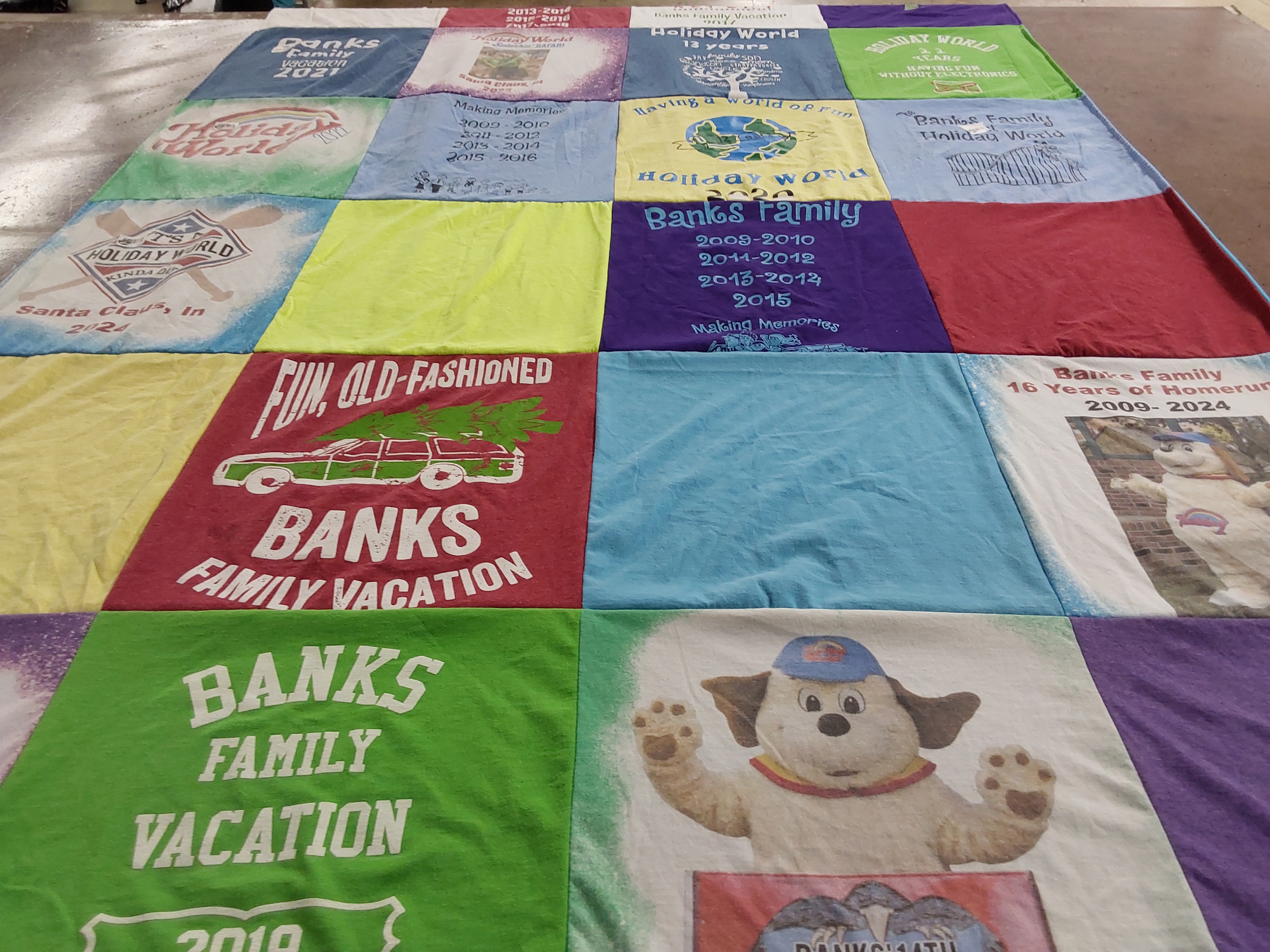 T-shirt quilt with family vacations, amusement parks themes by Joyce from KY
