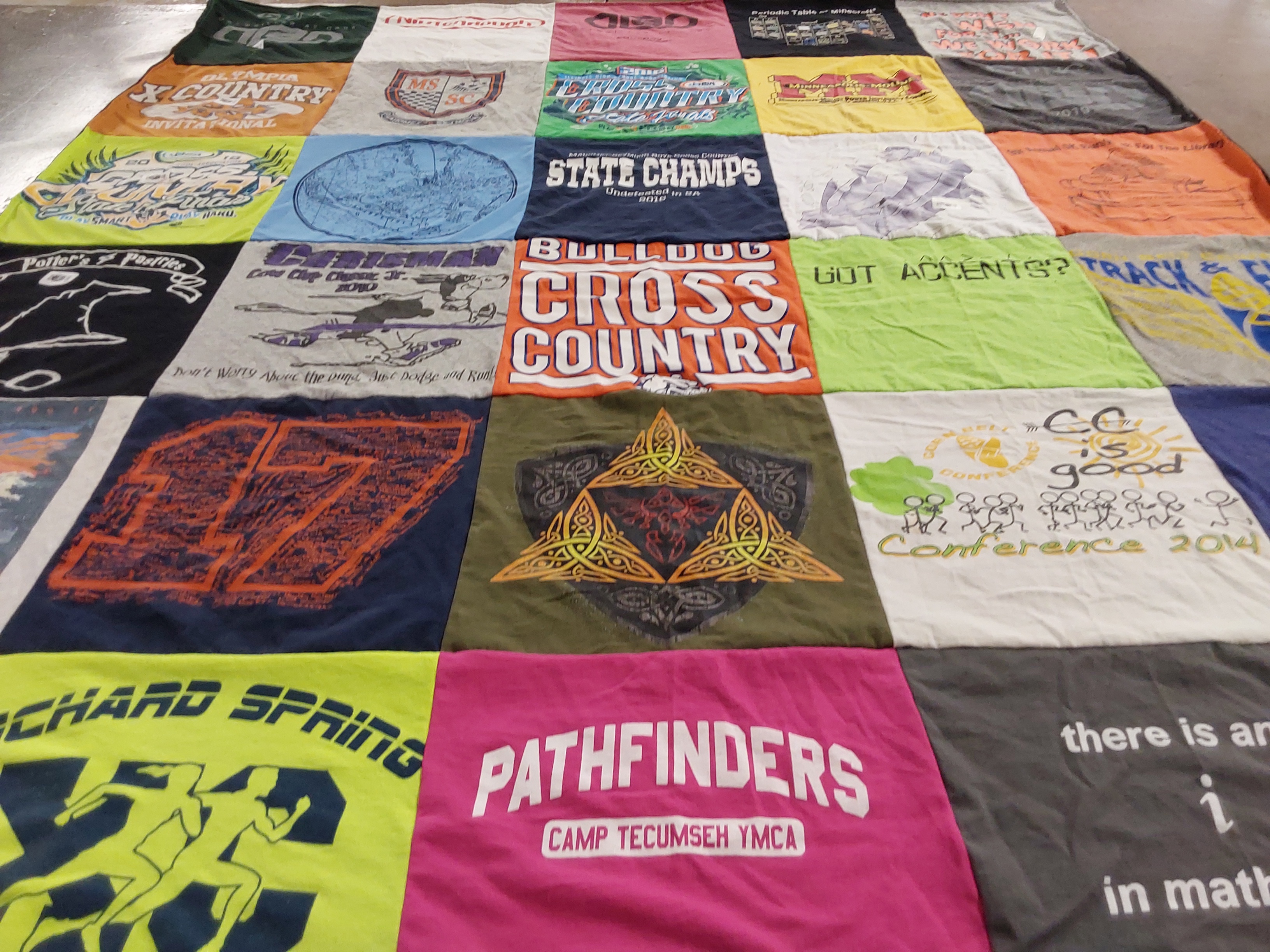 T-shirt quilt with running, cross country themes by Amy from IL