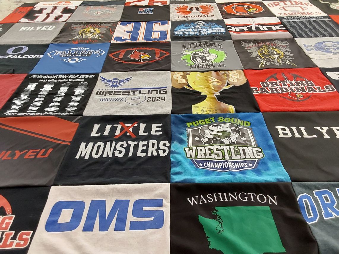 T-shirt quilt featuring ortin cardinals, oms falcons by Diana from WA