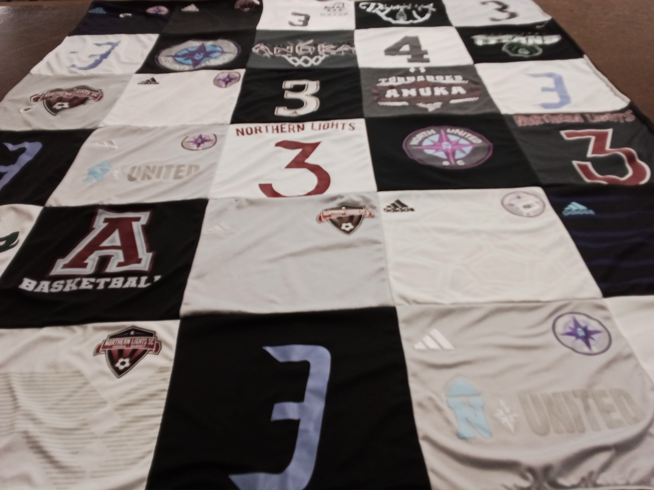 T-shirt quilt featuring northern lights sc by Angela from MN