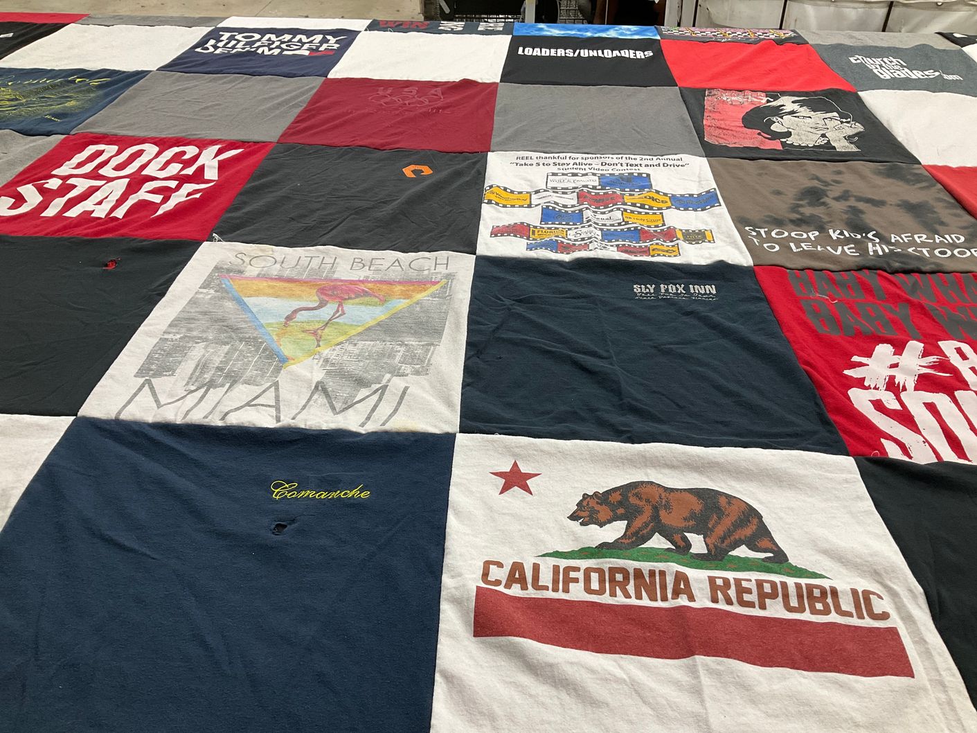 T-shirt quilt with beach, travel themes by Carlita from FL