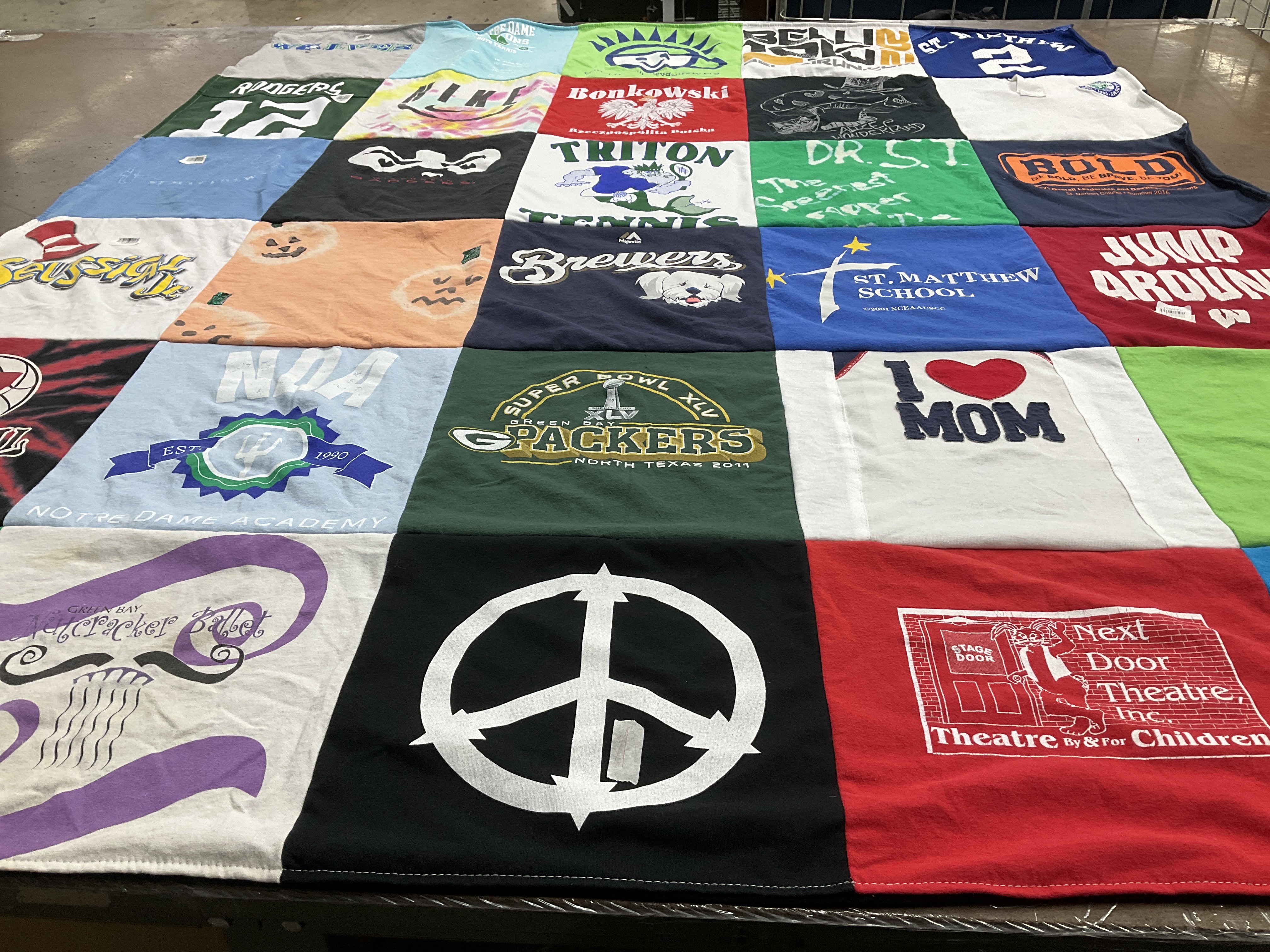 T-shirt quilt featuring green bay packers, milwaukee brewers by janet from WI