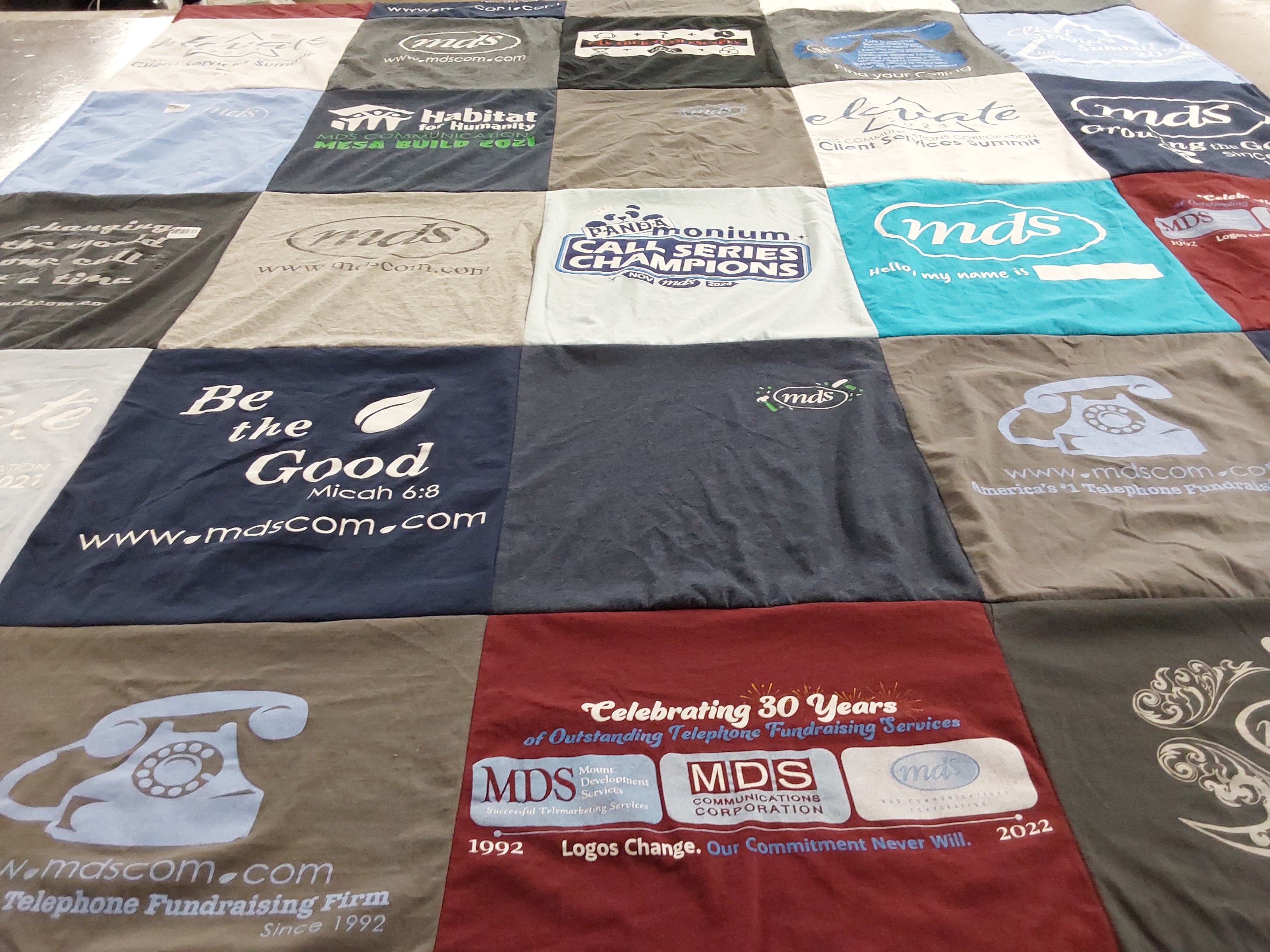 T-shirt quilt with fundraising, community service themes by Shannon from AZ