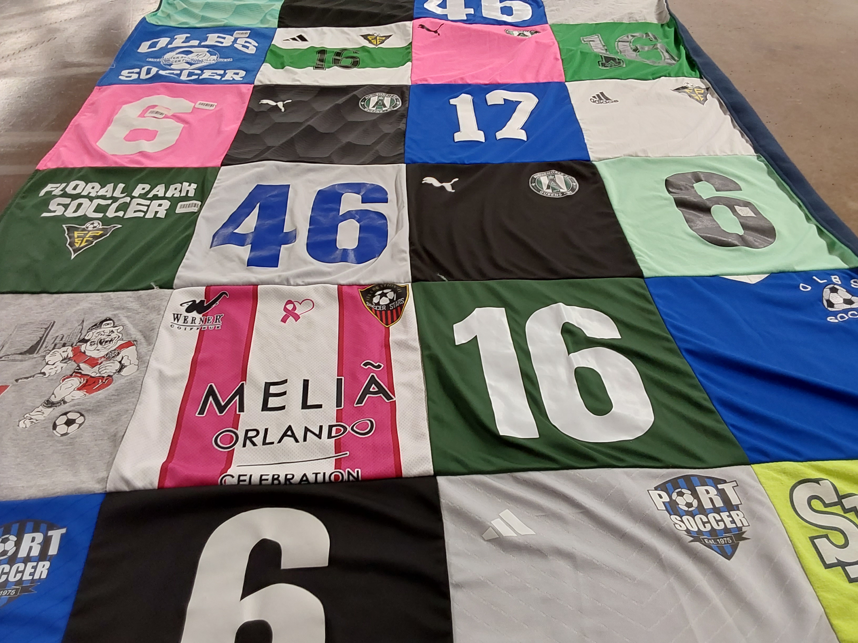T-shirt quilt with soccer themes by Karen from NY