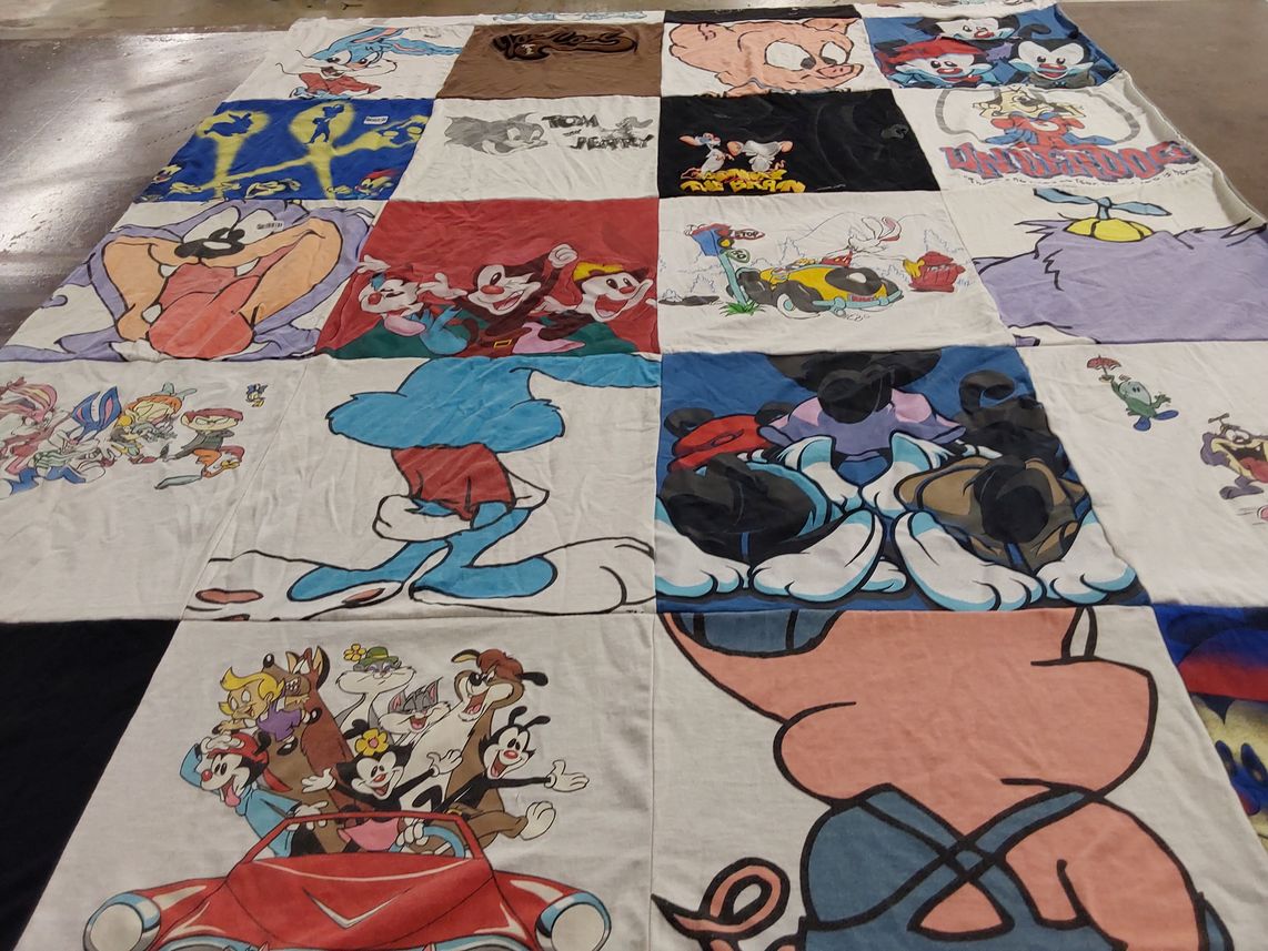 T-shirt quilt with animated shows, cartoons themes by Julie from NV