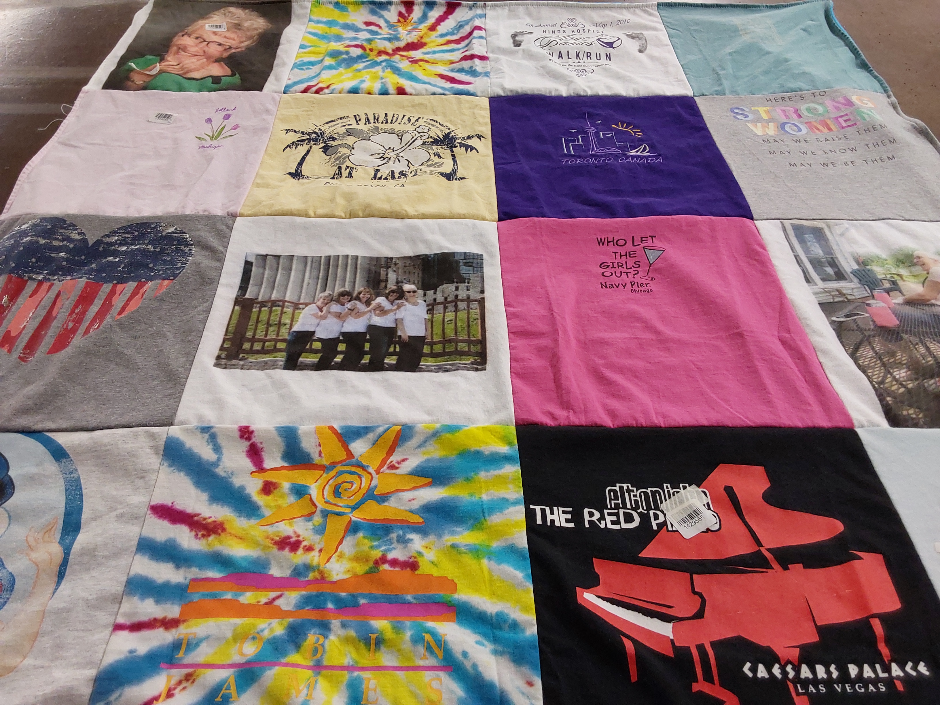 T-shirt quilt with travel, music themes by Amy from MN