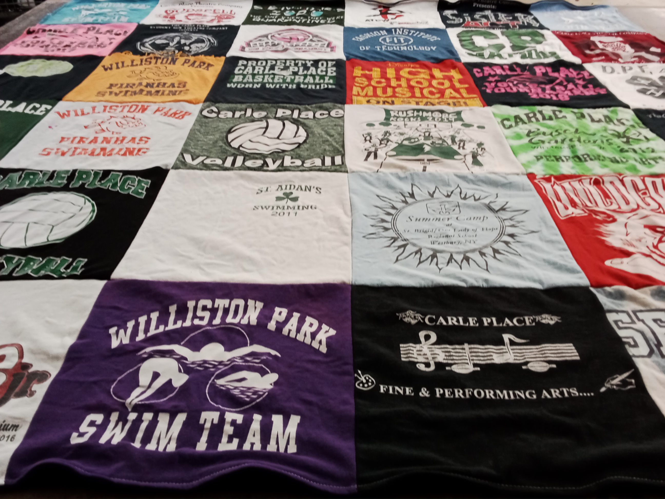 T-shirt quilt featuring carle place volleyball team, williston park swim team by Rachel from NY