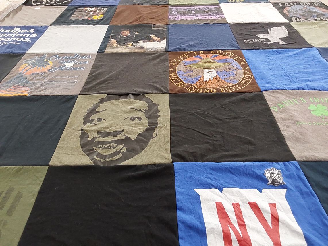T-shirt quilt with music, sports themes by Debra from PA