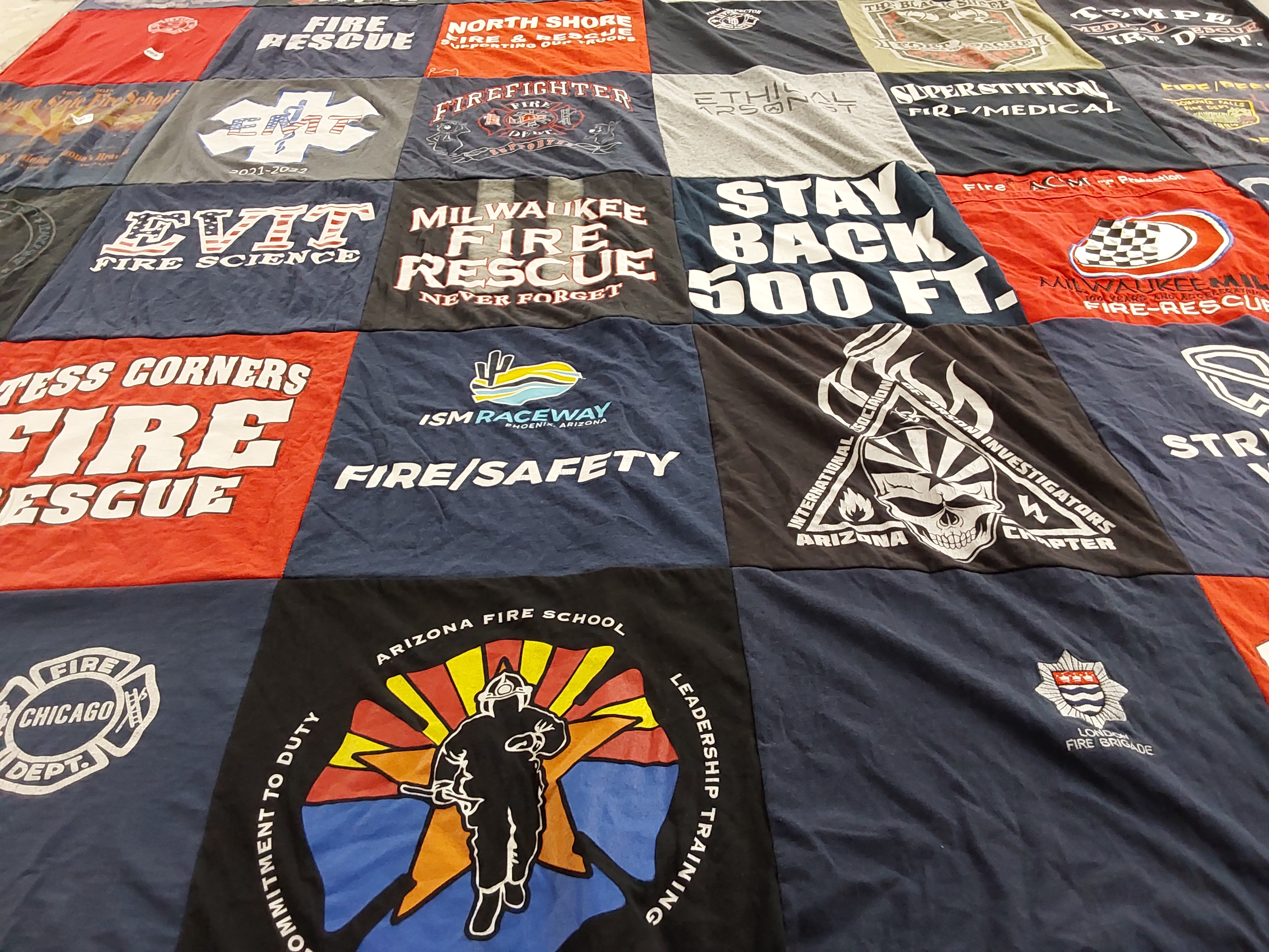 T-shirt quilt with fire safety, fire science themes by Jerome from AZ