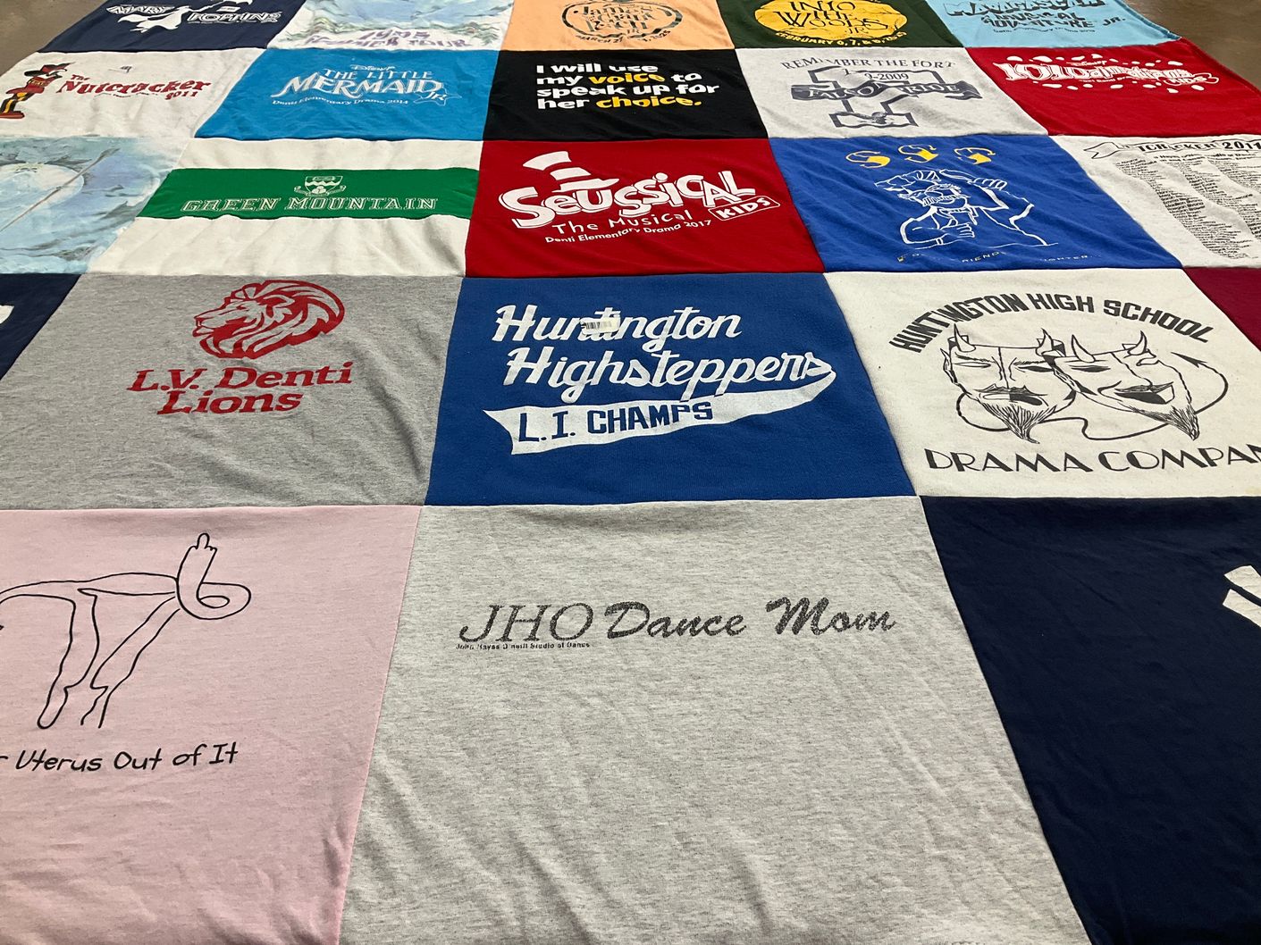 T-shirt quilt featuring l.v. denti lions by Barbara from NY