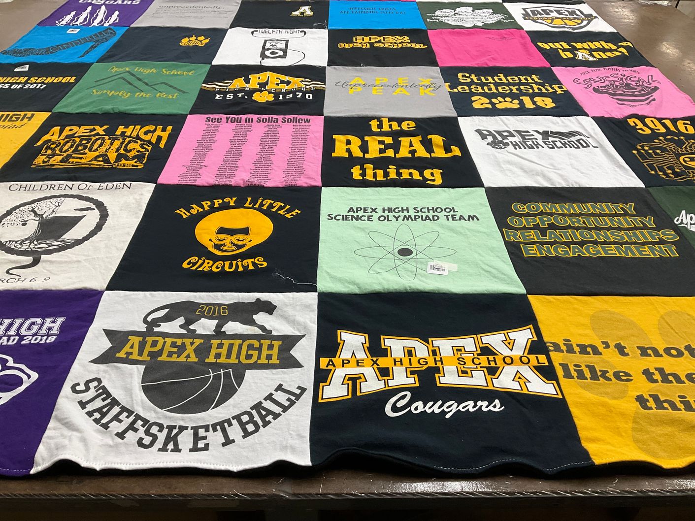 T-shirt quilt featuring apex high school cougars by Joshua from NC