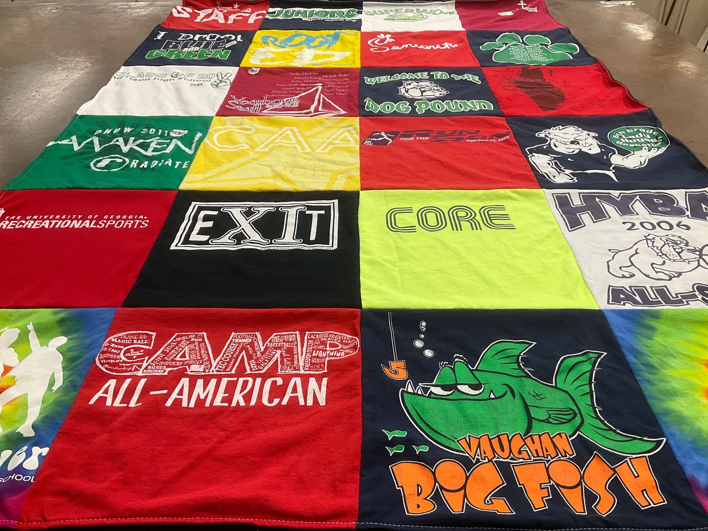 T-shirt quilt with camping, sports themes by Jan from GA