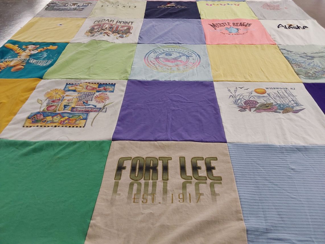 T-shirt quilt with theme parks, beaches themes by Kelly from VA
