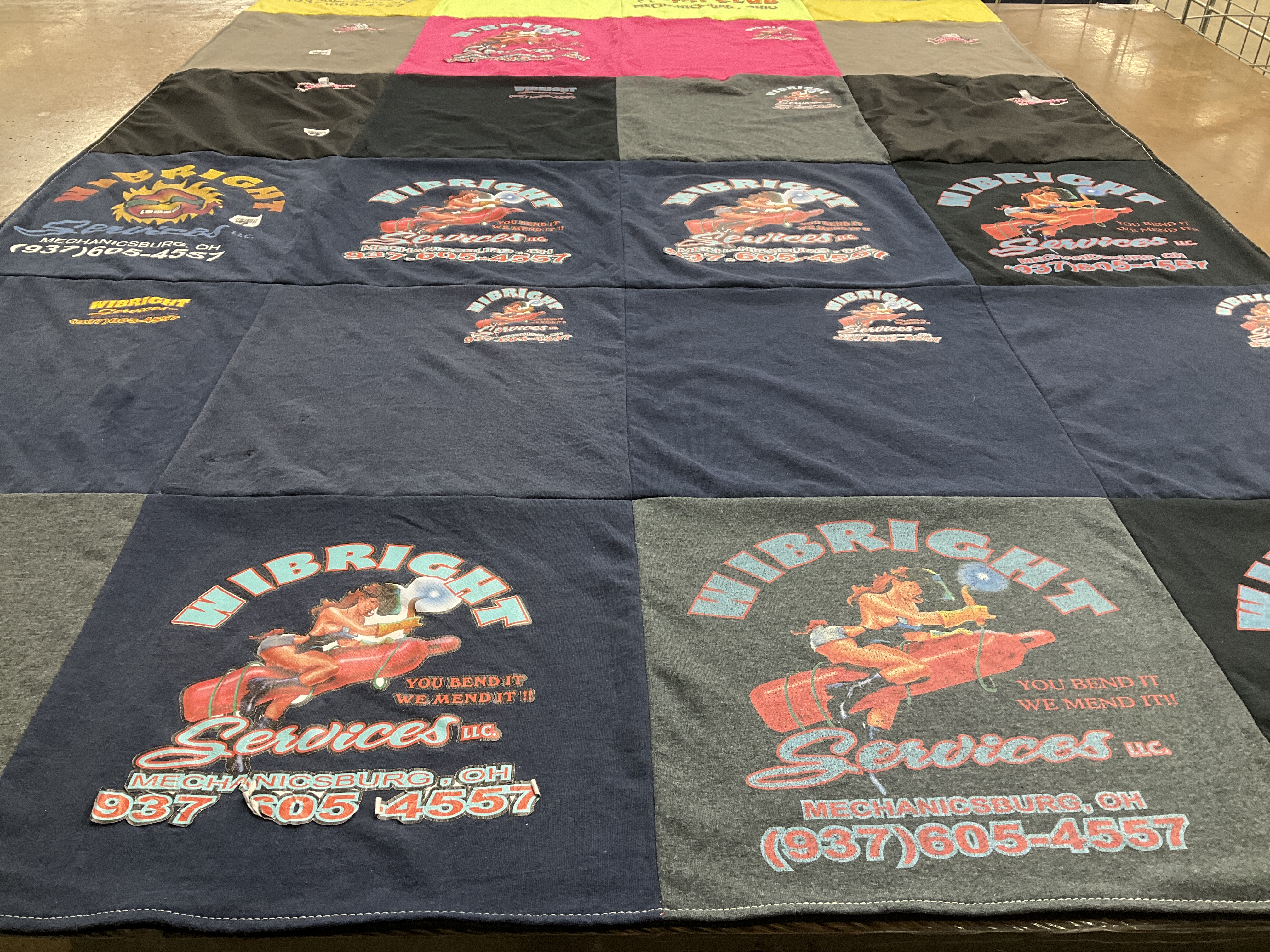 T-shirt quilt with automotive, repair themes by BETSY from OH