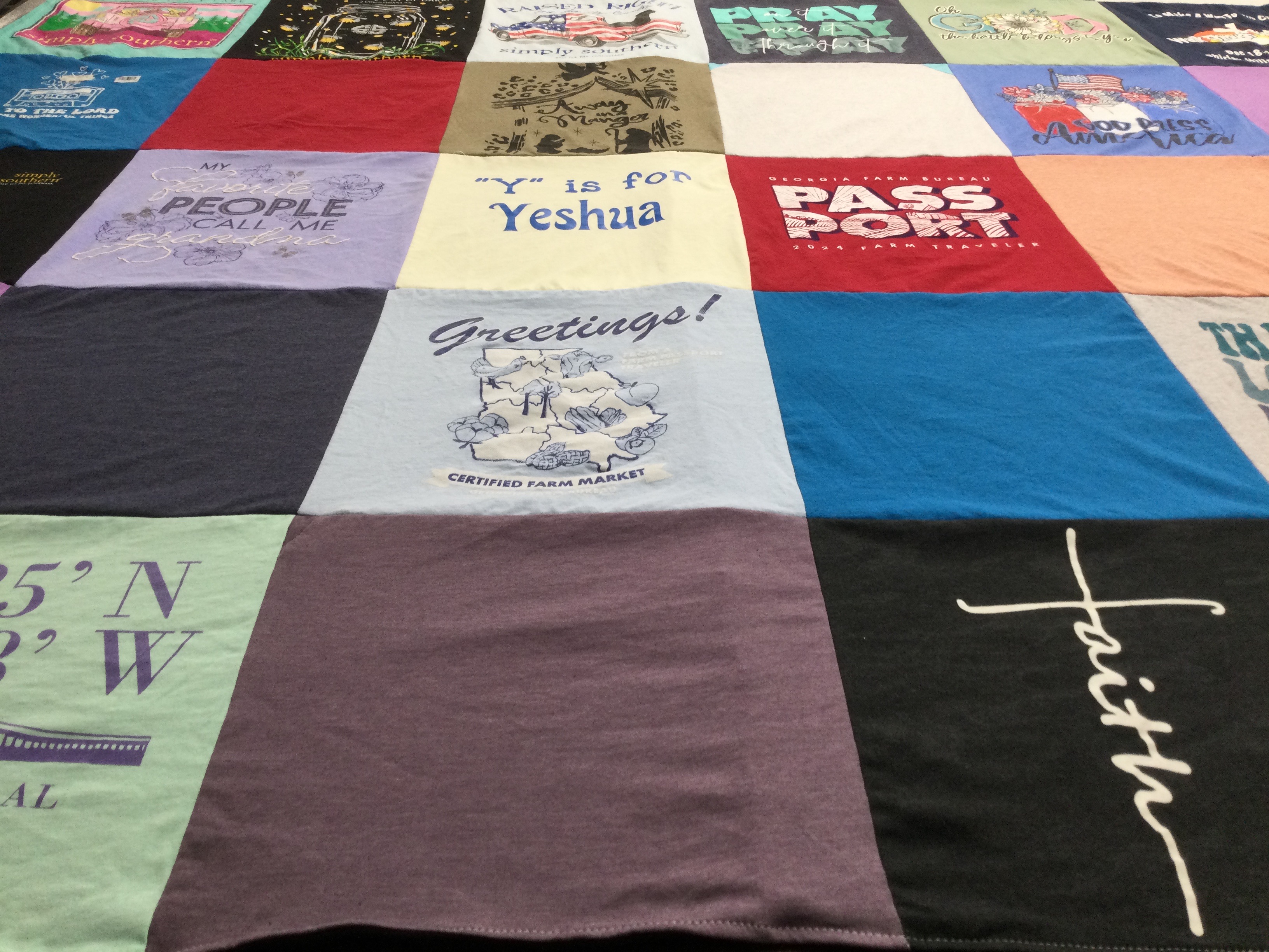 T-shirt quilt with spirituality, traveling themes by Lynn from GA