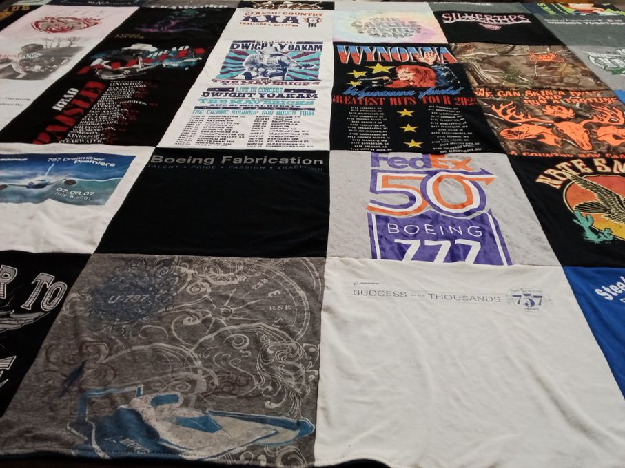 T-shirt quilt with aviation, music themes by Johanna from WA