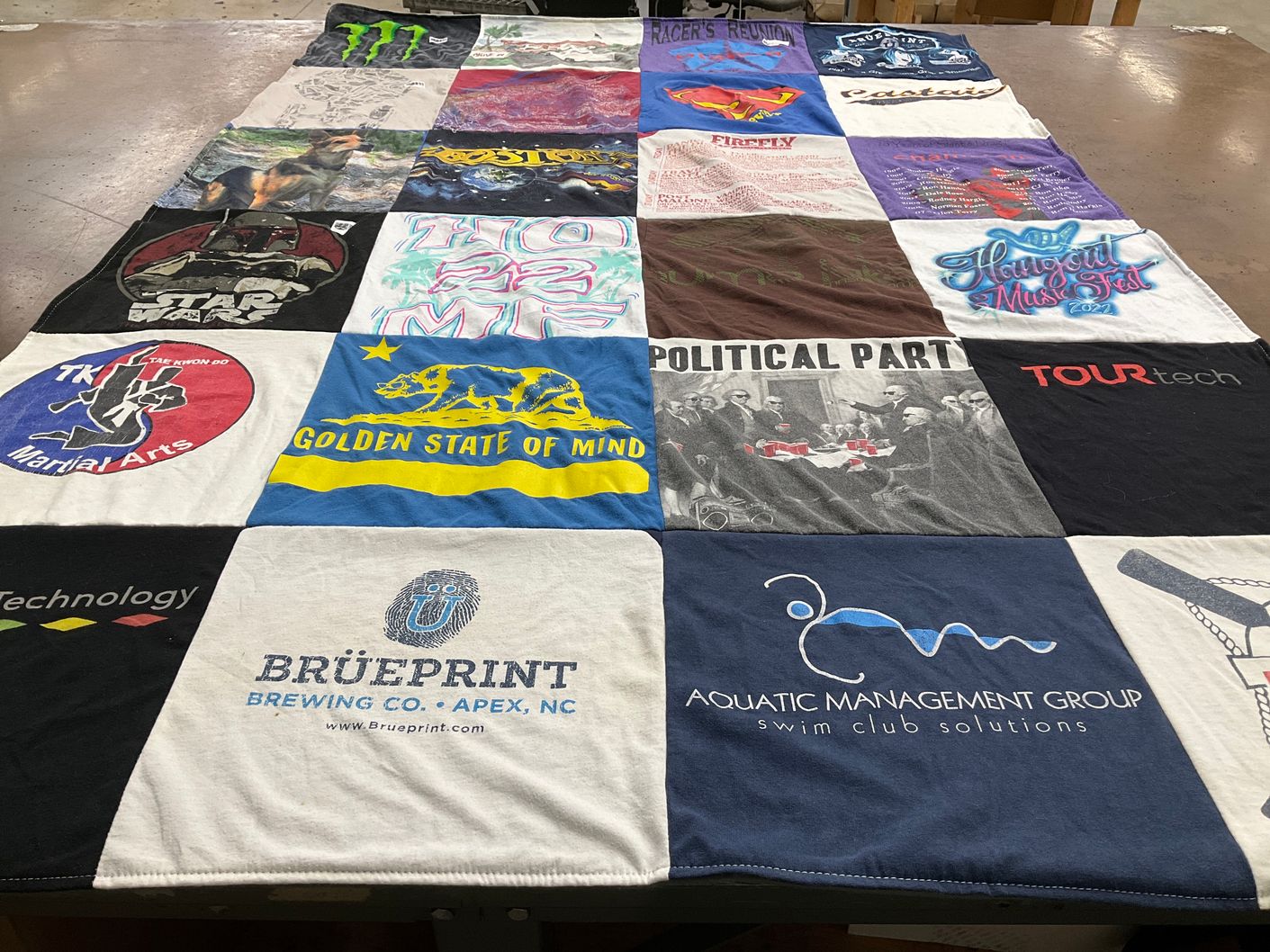 T-shirt quilt with martial arts, music festivals themes by Lynn from NC