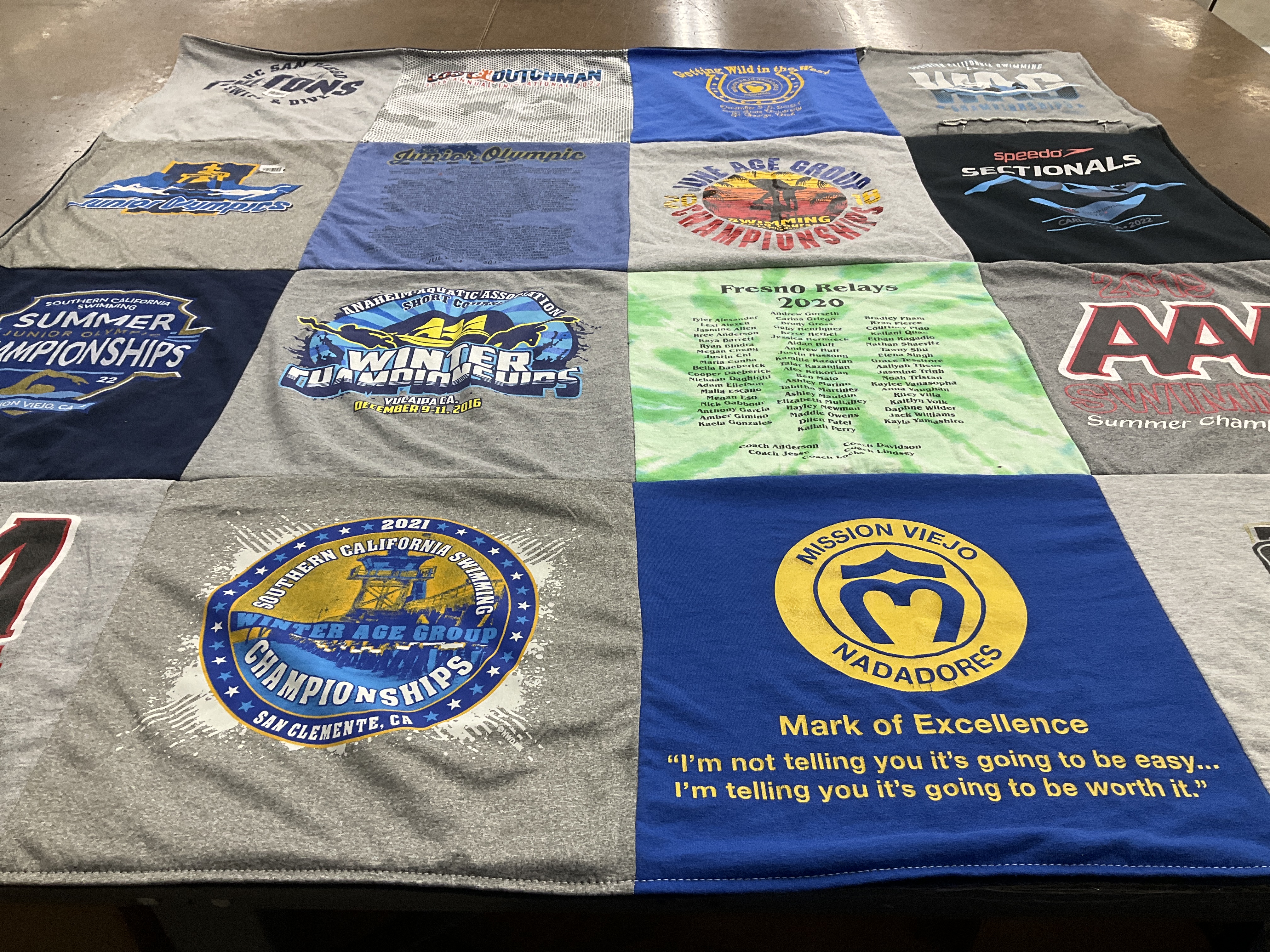 T-shirt quilt with swimming, sports themes by John from AZ