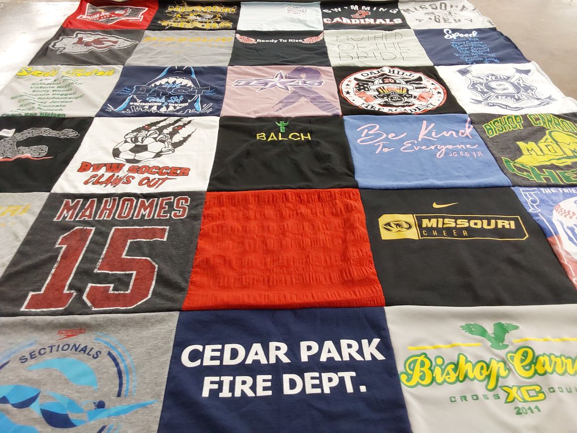 T-shirt quilt featuring bishop carroll cross country team, missouri cheerleading team by Eileen from KS