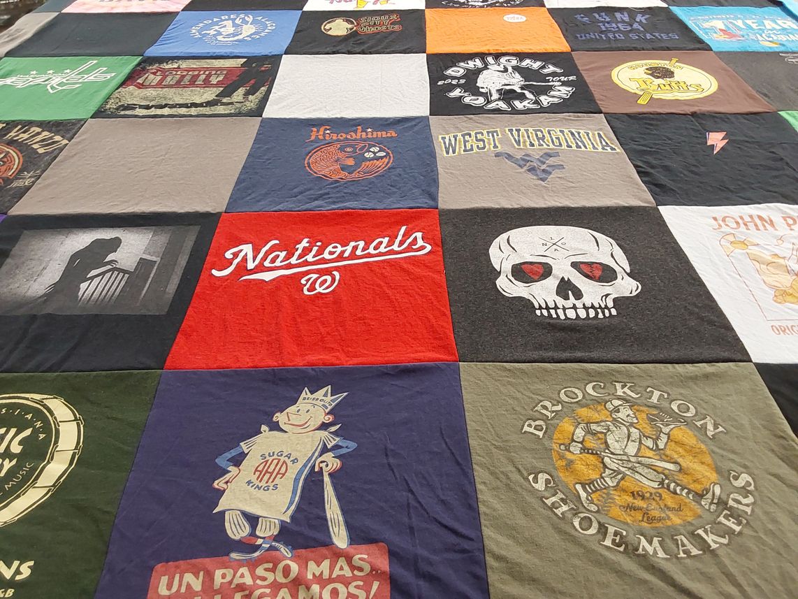 T-shirt quilt with sports, music themes by Ralph from VA