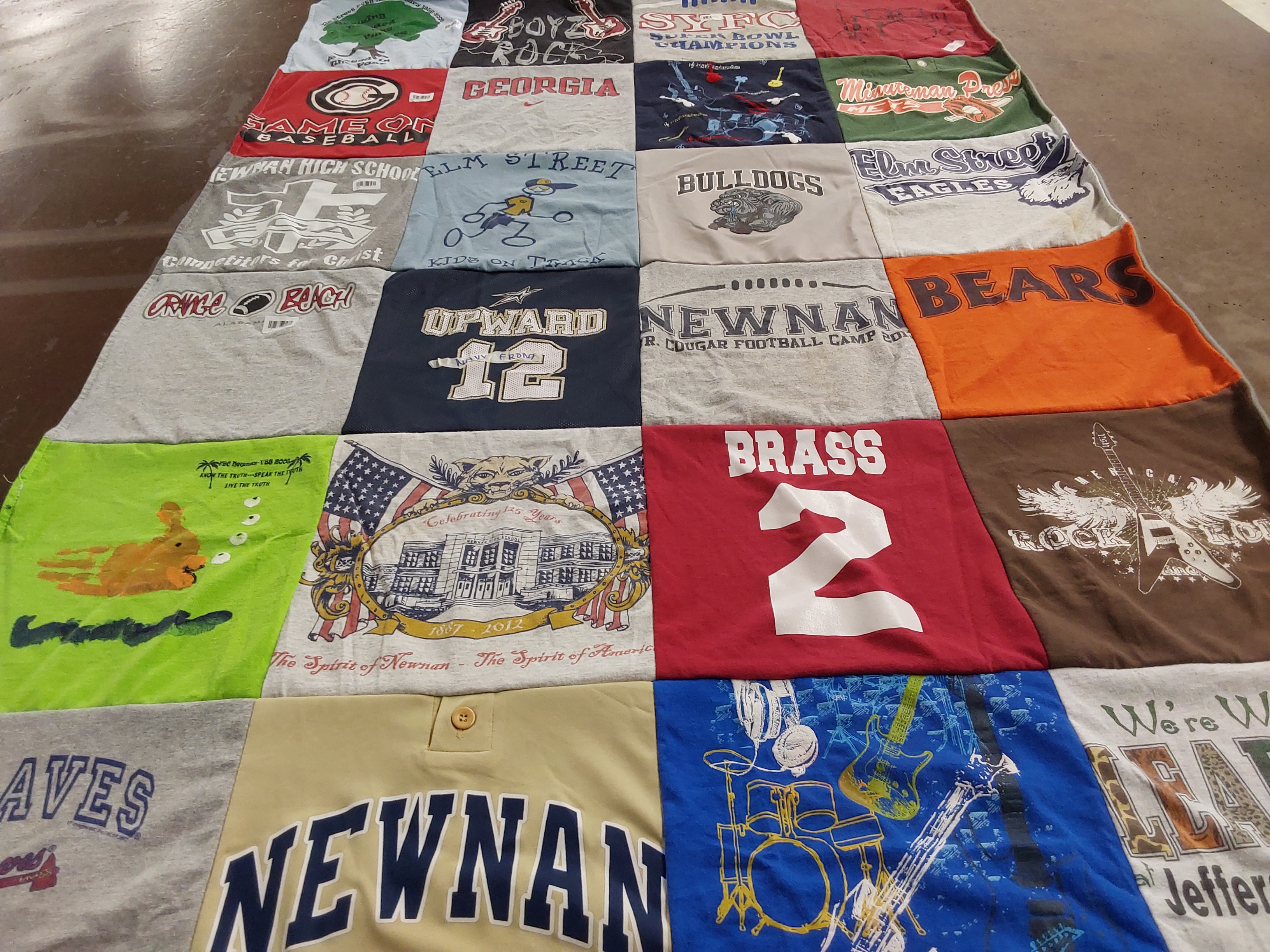 T-shirt quilt featuring newnan cougars, elms street eagles by Sally from GA