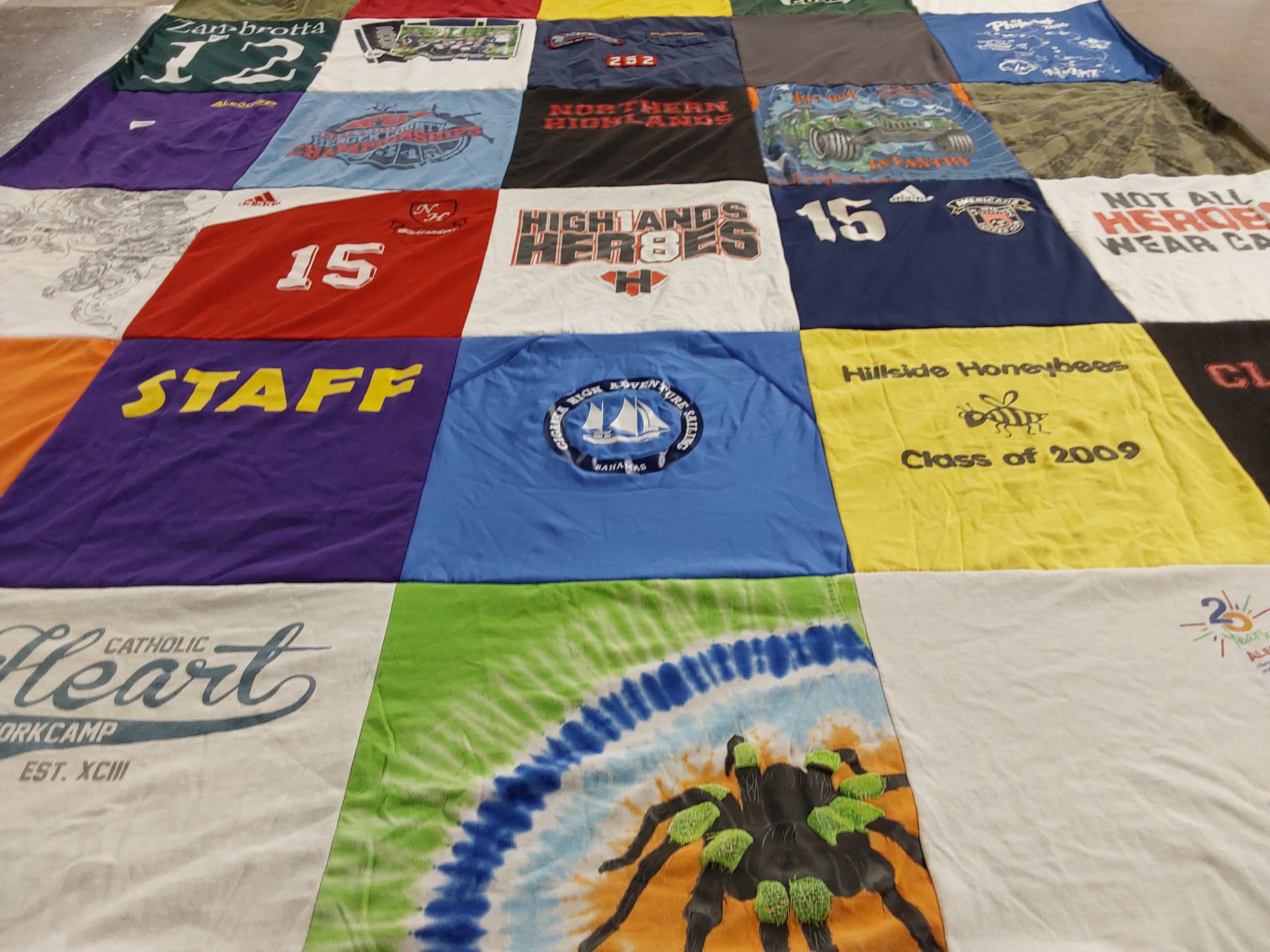T-shirt quilt featuring hillside honeybees by Almida from NJ