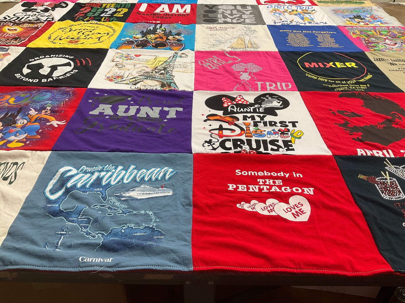T-shirt quilt with travel, family themes by Zina from GA
