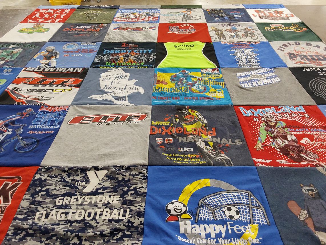 T-shirt quilt with bmx, soccer themes by Terri from AL