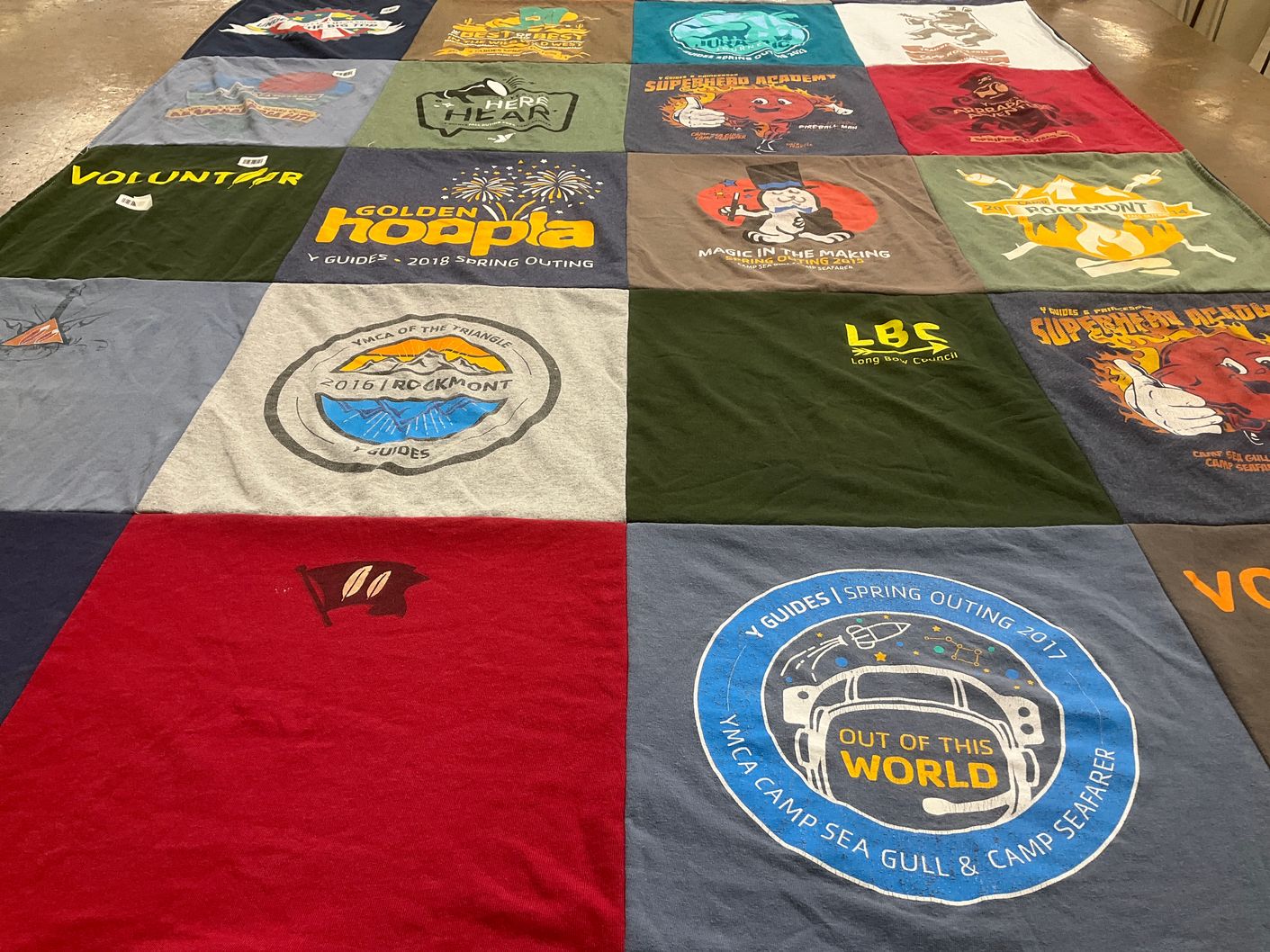 T-shirt quilt with camping, volunteering themes by Marc from NC