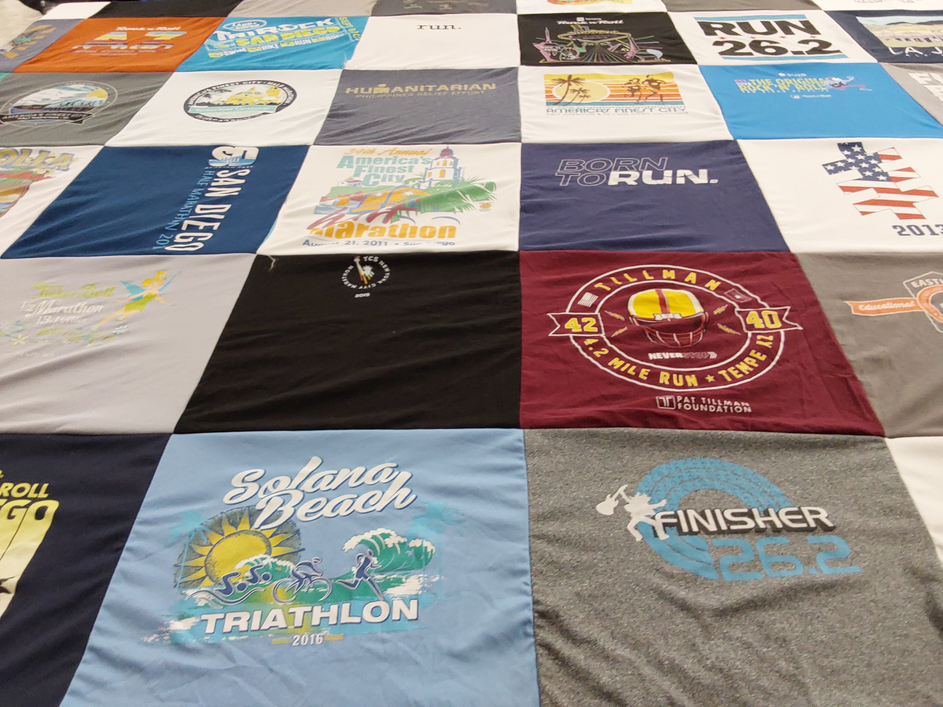 T-shirt quilt with running, triathlons themes by Scott from CA