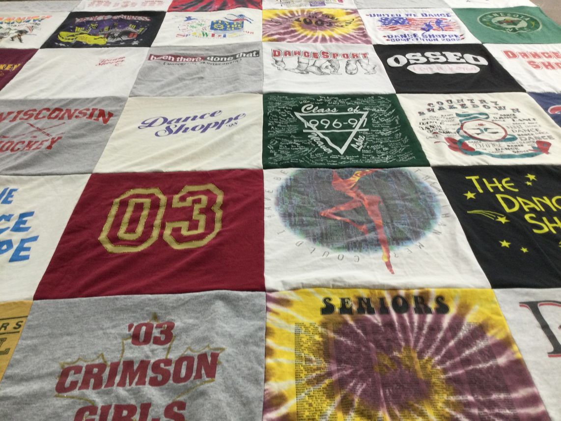 T-shirt quilt with dance, hockey themes by Alyssa from NY