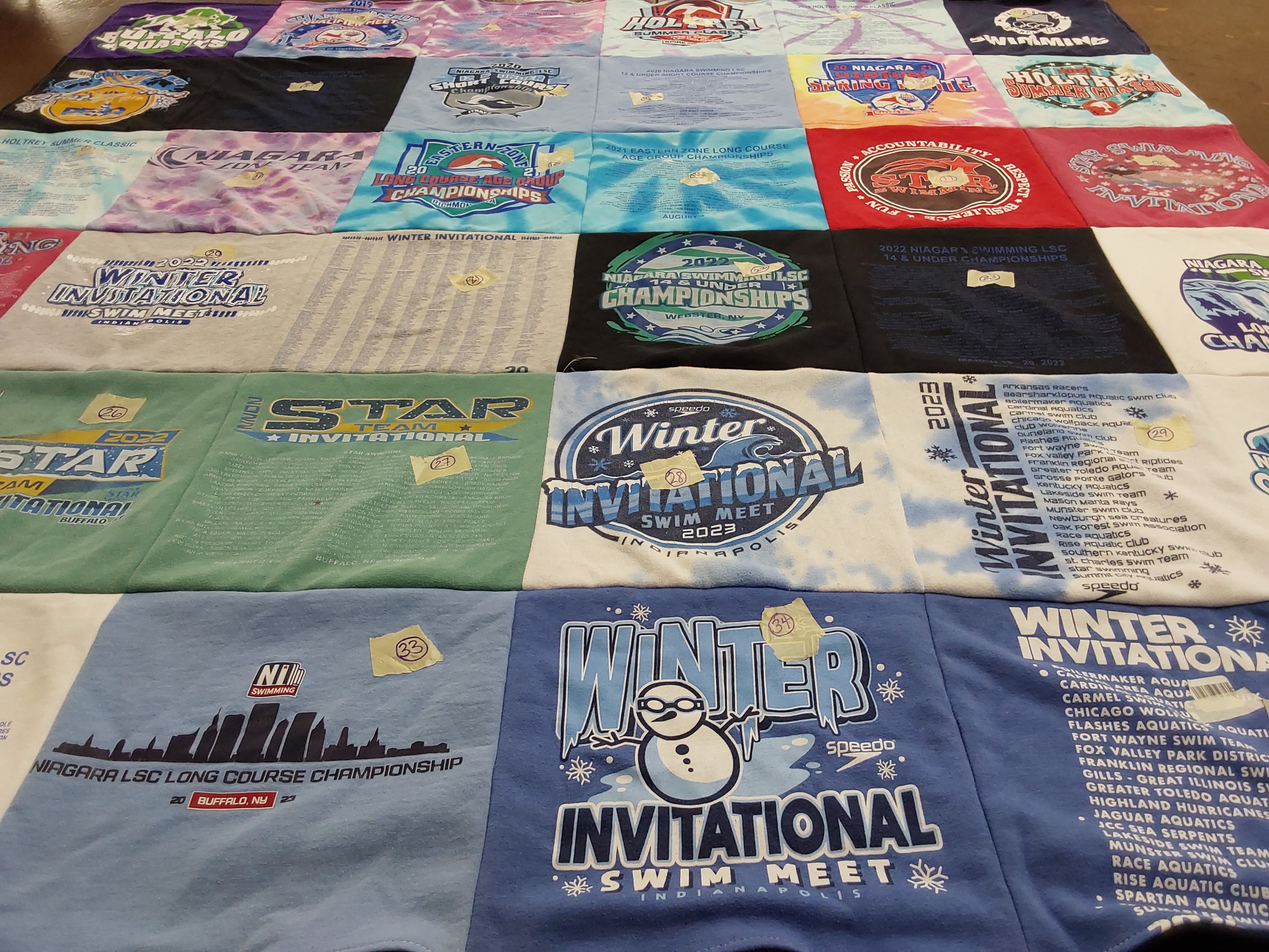 T-shirt quilt with swimming, sports themes by Jessica from NY