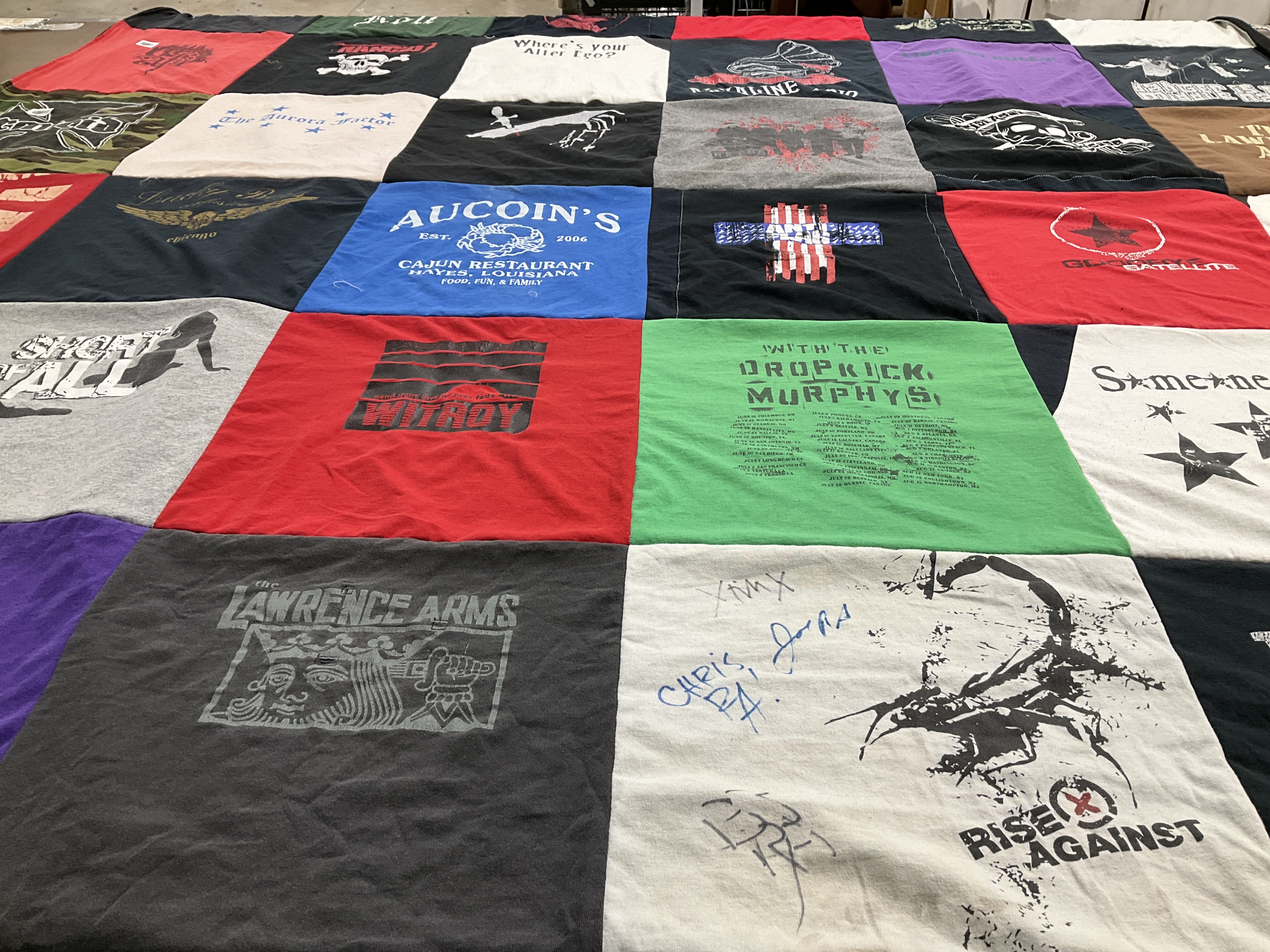 T-shirt quilt with music, restaurants themes by Kara from WI