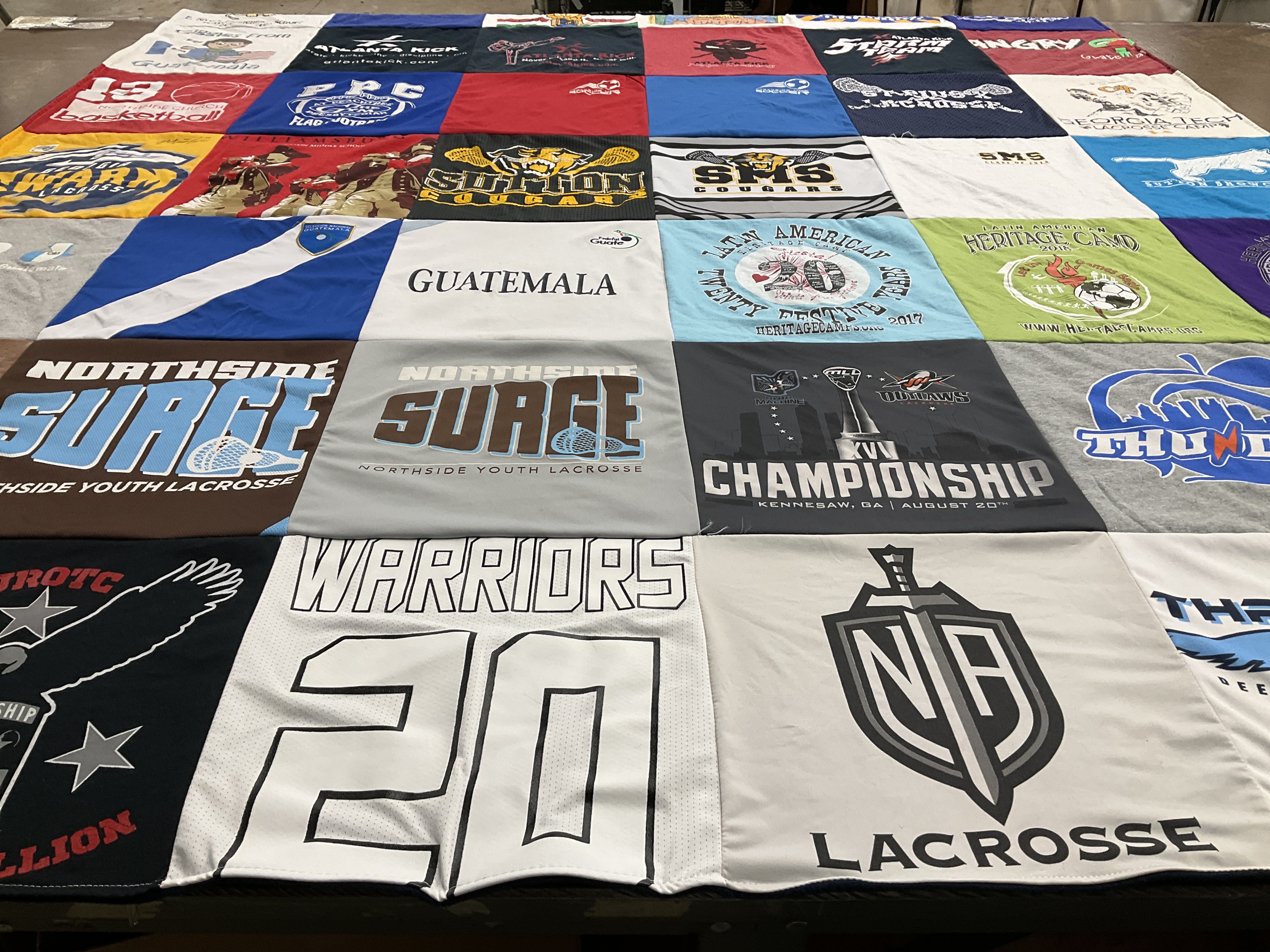 T-shirt quilt with lacrosse, sports themes by Debra from GA