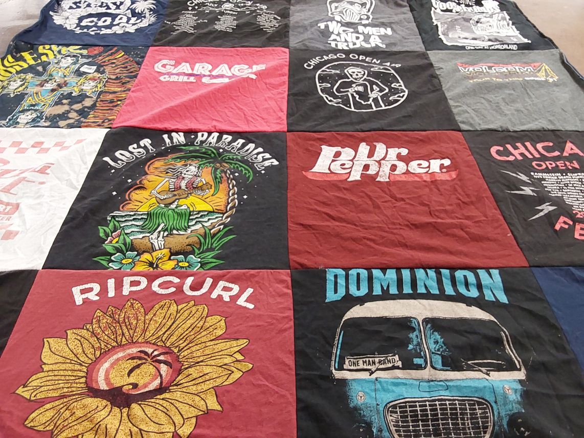 T-shirt quilt with surfing, coastal culture themes by Emily from IL
