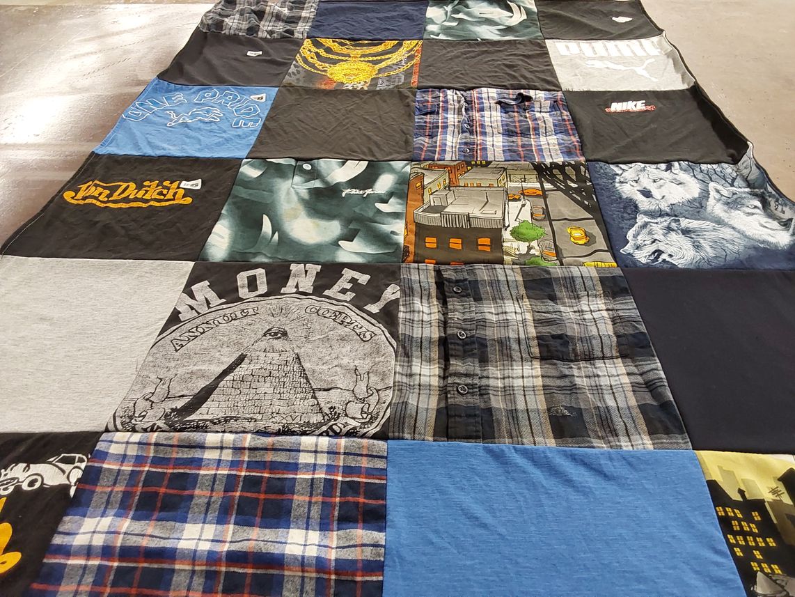 T-shirt quilt with fashion, art themes by Angela from MI