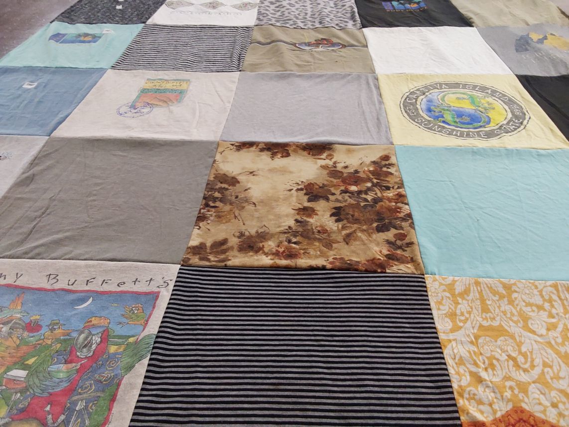 T-shirt quilt with music, travel themes by Tracy from TX