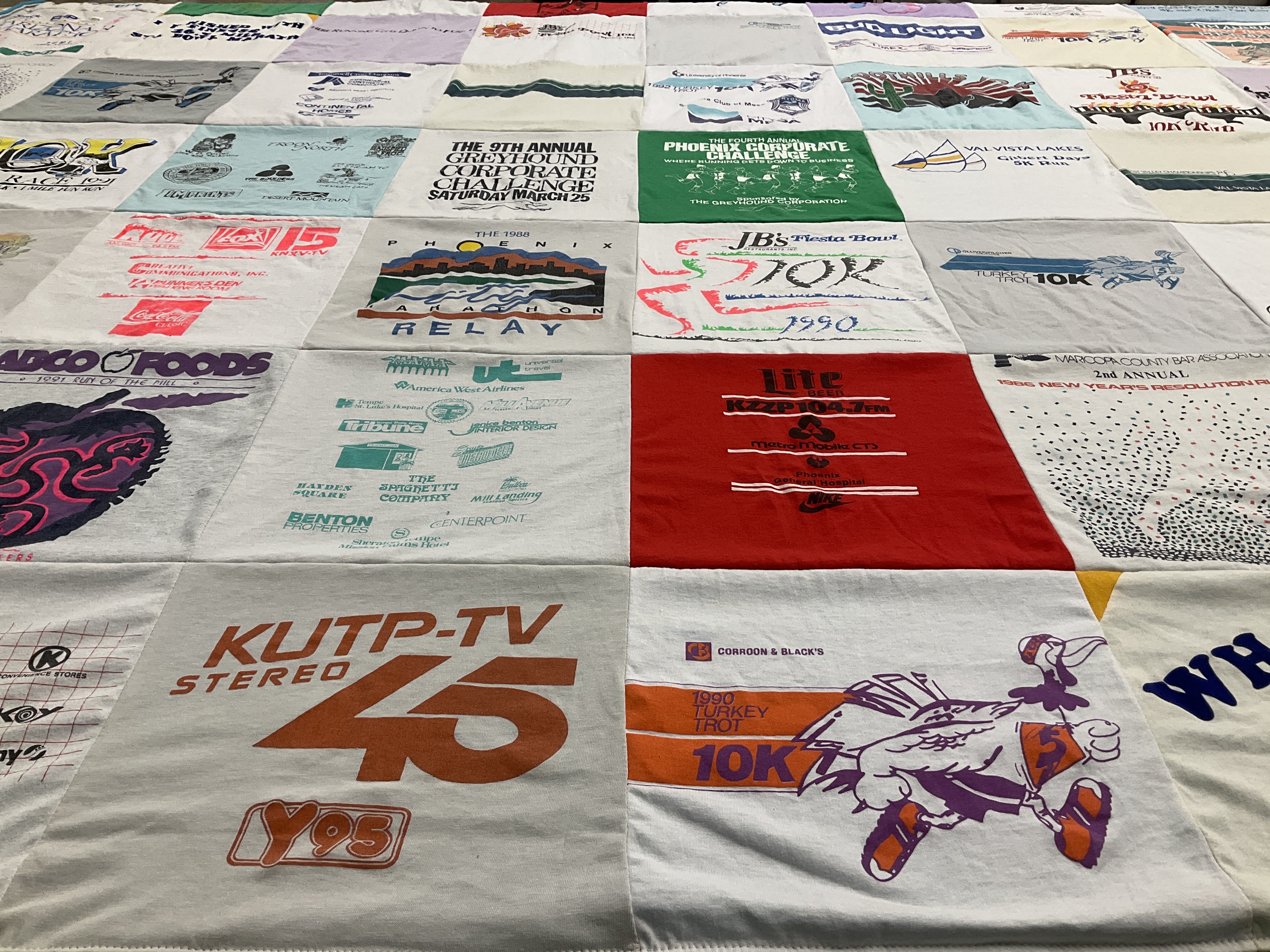 T-shirt quilt with running, events themes by Maureen from AZ
