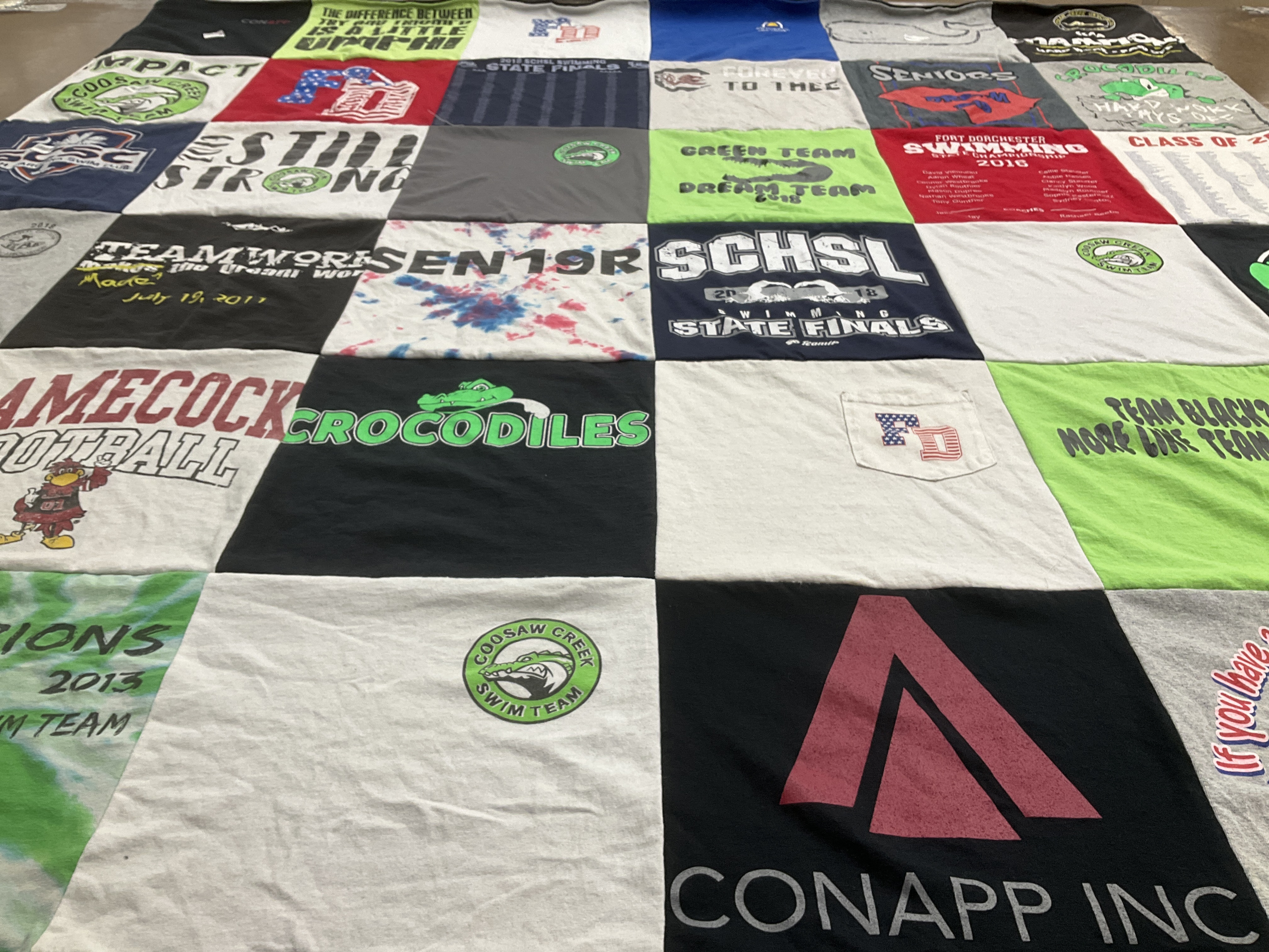 T-shirt quilt featuring coosaw creek swim team by Sonya from SC