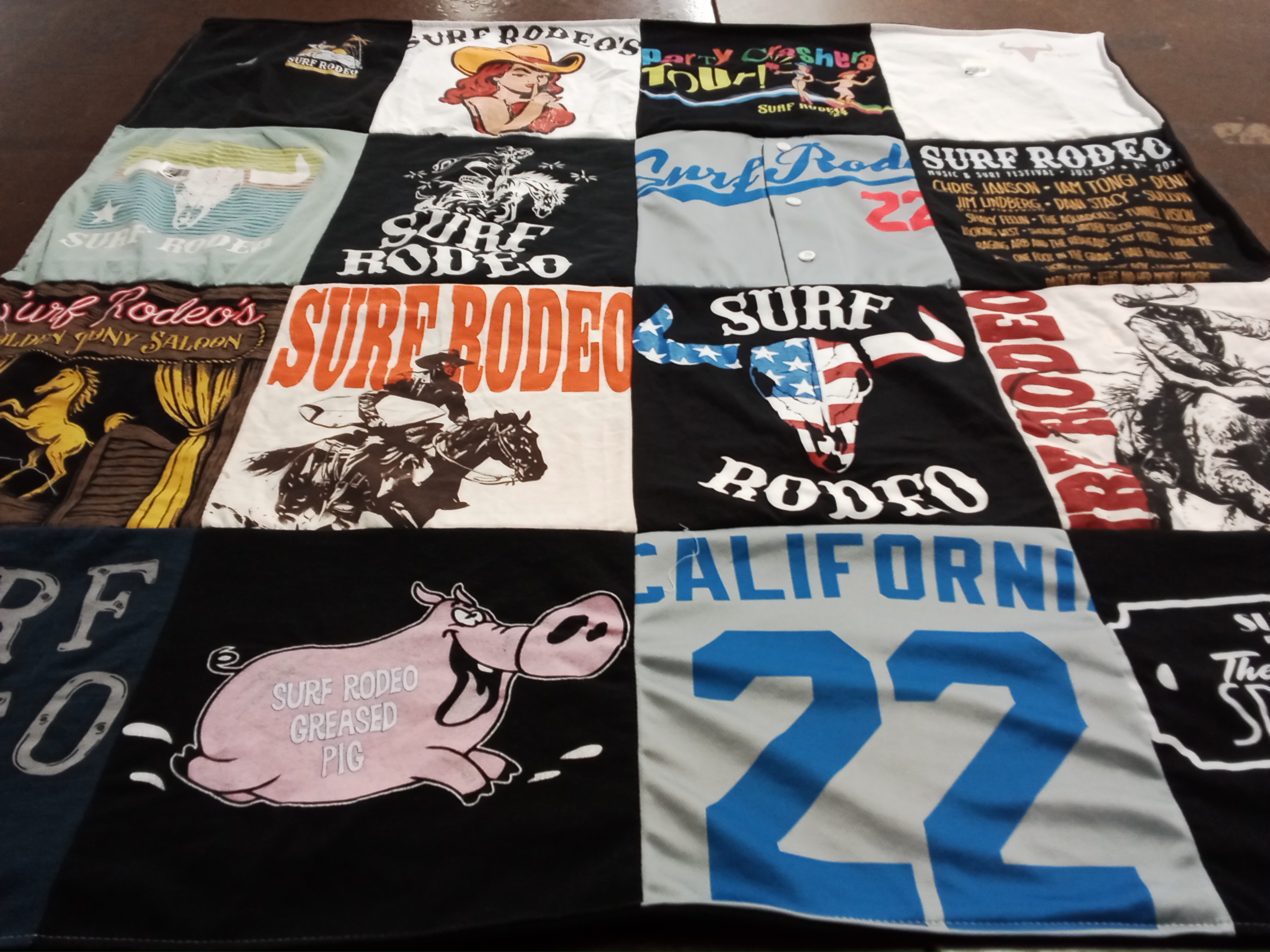 T-shirt quilt with rodeo, surfing themes by Candice from CA